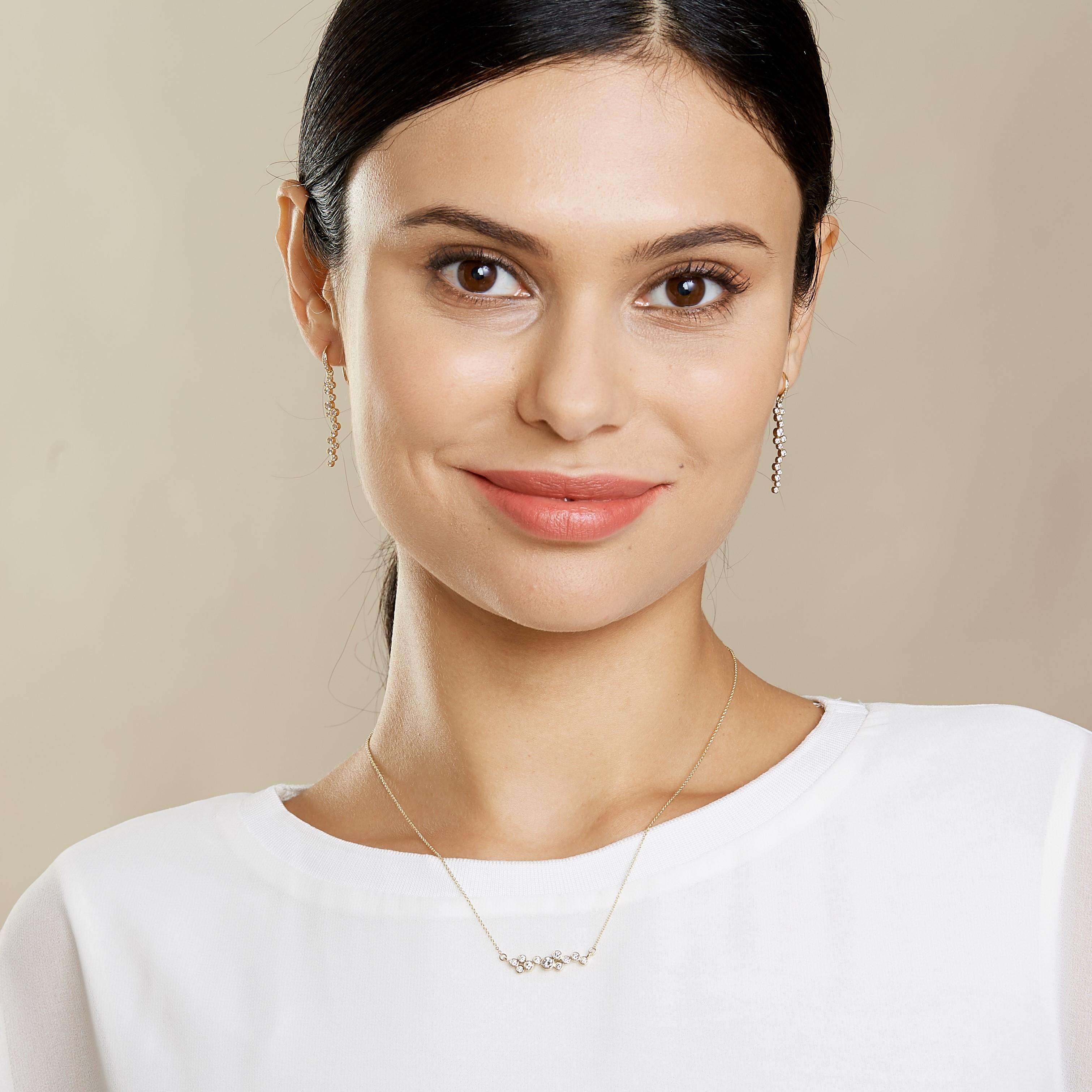 Created in 18kyg
Diamonds 0.80 cts approx

These exquisite earrings offer a chance to dazzle and captivate. Crafted from 18 karat yellow gold and encrusted with diamond accents, these Diamond Earrings exemplify chic elegance and sophistication.