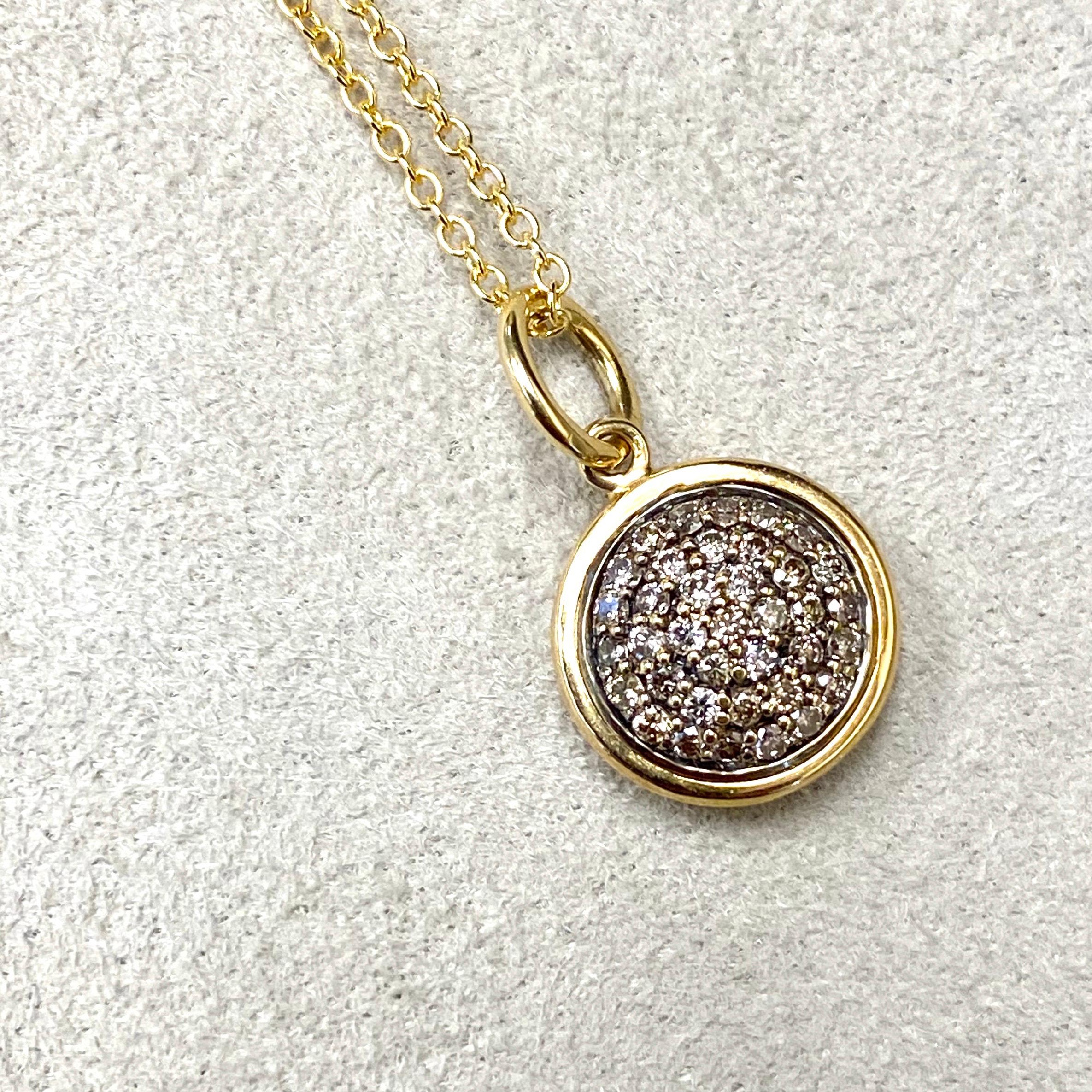 Created in 18 karat yellow gold
10 mm size charm
Brown Diamonds 0.30 ct approx
Chain sold separately 

This gorgeous 18 karat yellow gold variation of our pendant is a delicately crafted 10 mm emblem, encrusted with shimmering brown diamonds