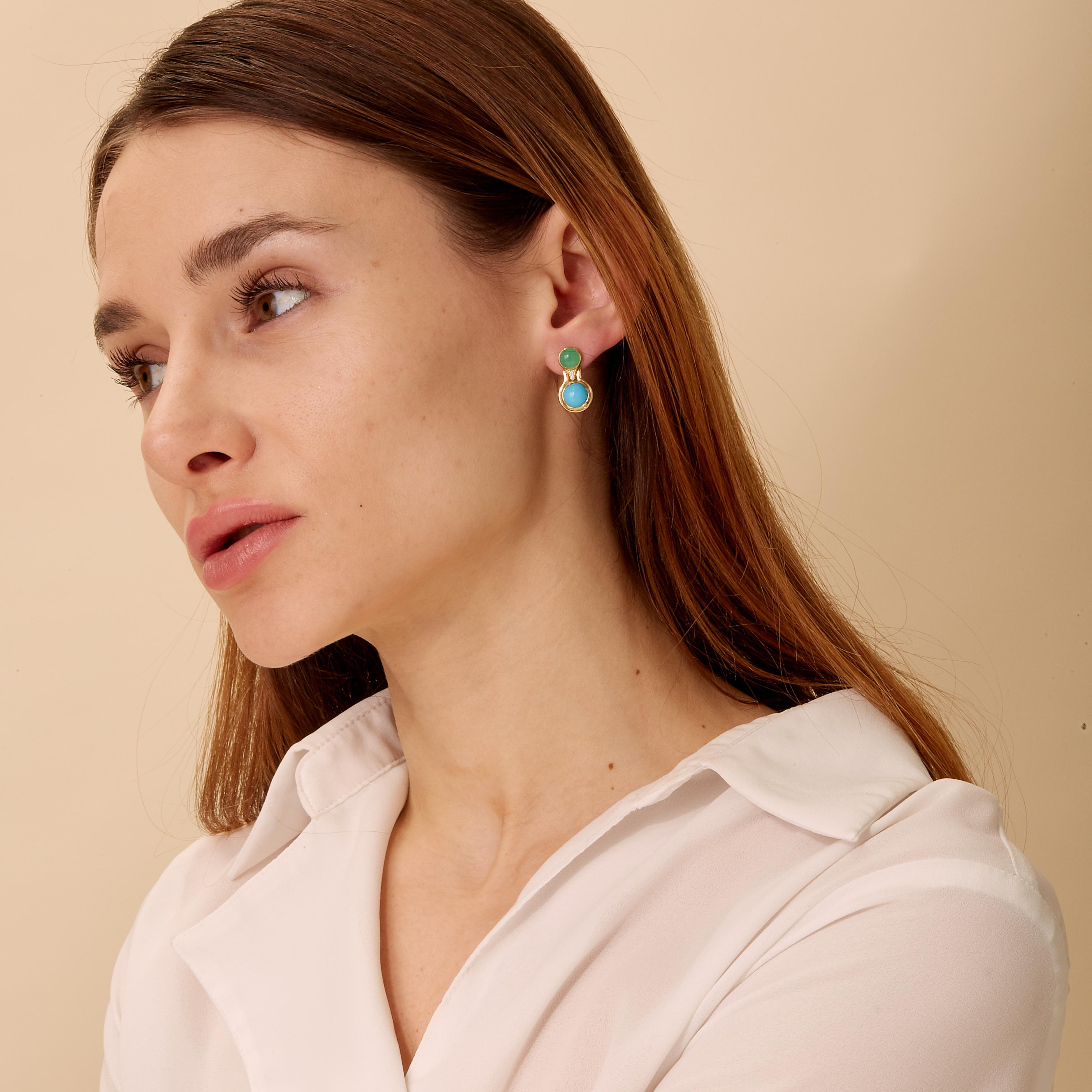 Created in 18 karat yellow gold
Chrysoprase 2.50 carats approx.
Turquoise 3 carats approx.
Diamonds 0.03 carat approx.
18kyg Butterfly backs
Limited Edition


Exquisitely crafted from 18 karat yellow gold, these limited edition earrings feature