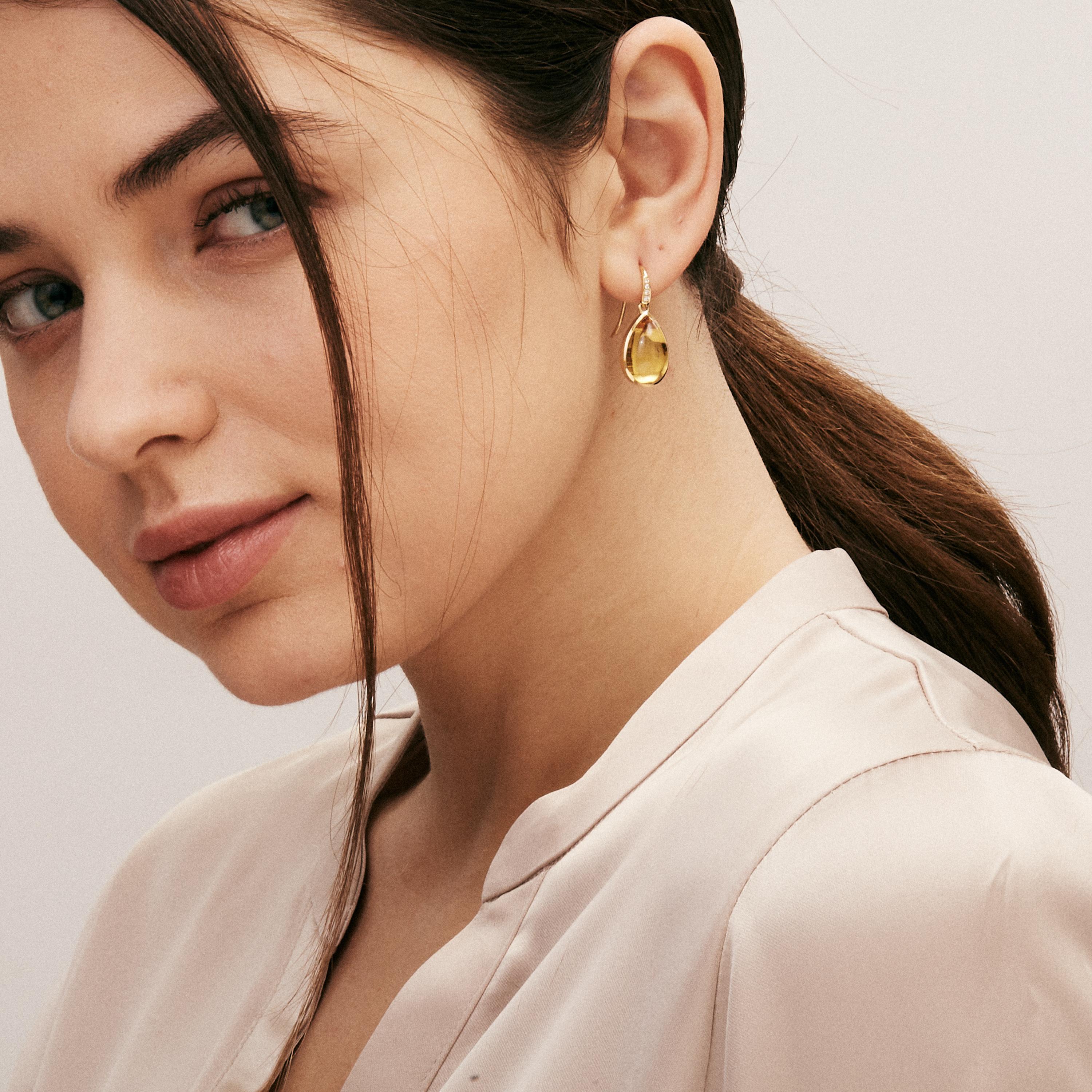 Created in 18 karat yellow gold
Citrine 11.50 carats approx.
Diamonds 0.05 carat approx.
Limited edition

Crafted from 18 karat yellow gold, these exclusive earrings feature shimmering moon quartz that total 11.50 carats, and delicate diamonds