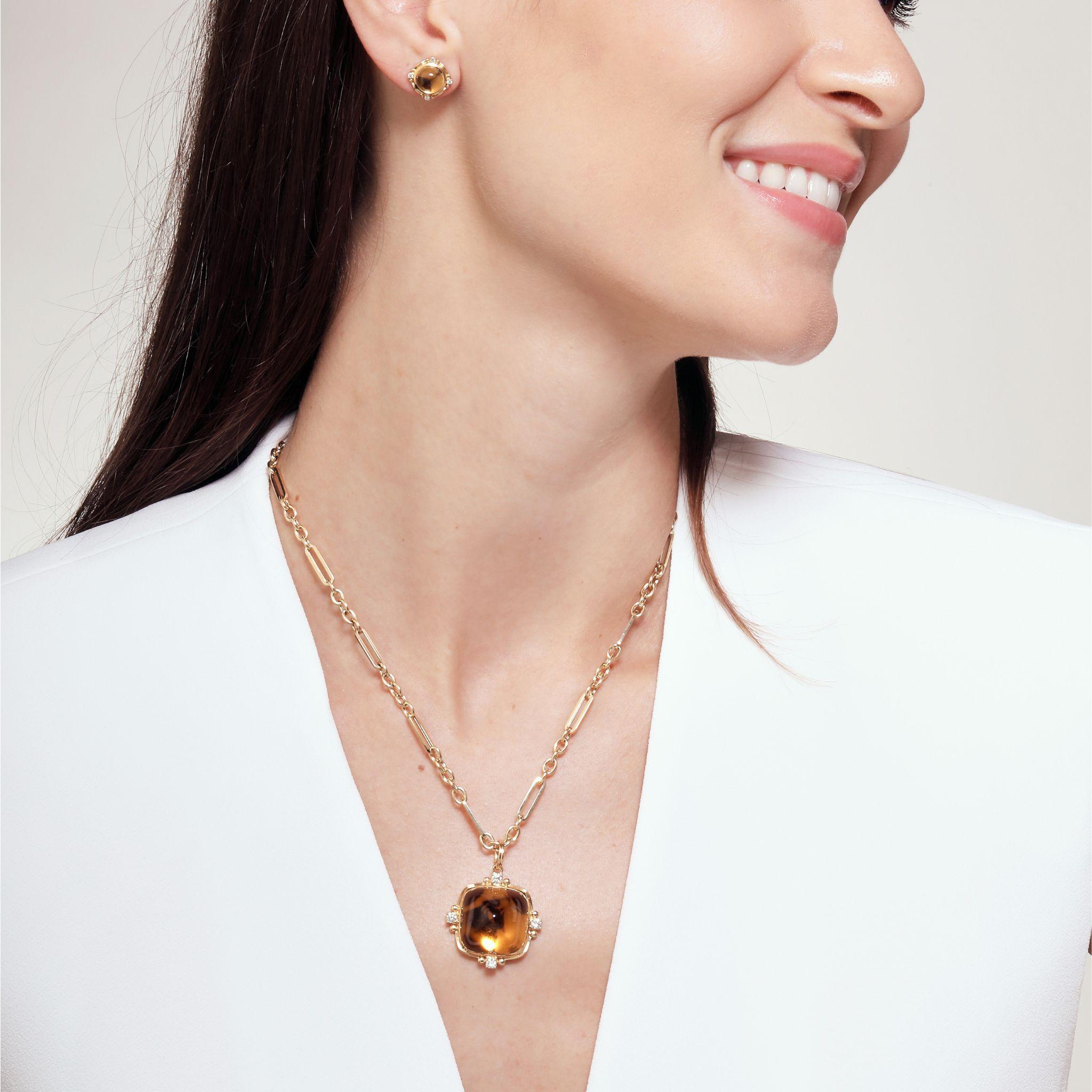 Created in 18 karat yellow gold
Citrine 35 carats approx.
Diamonds 0.40 carat approx.
Chain sold separately



 About the Designers ~ Dharmesh & Namrata

Drawing inspiration from little things, Dharmesh & Namrata Kothari have created an