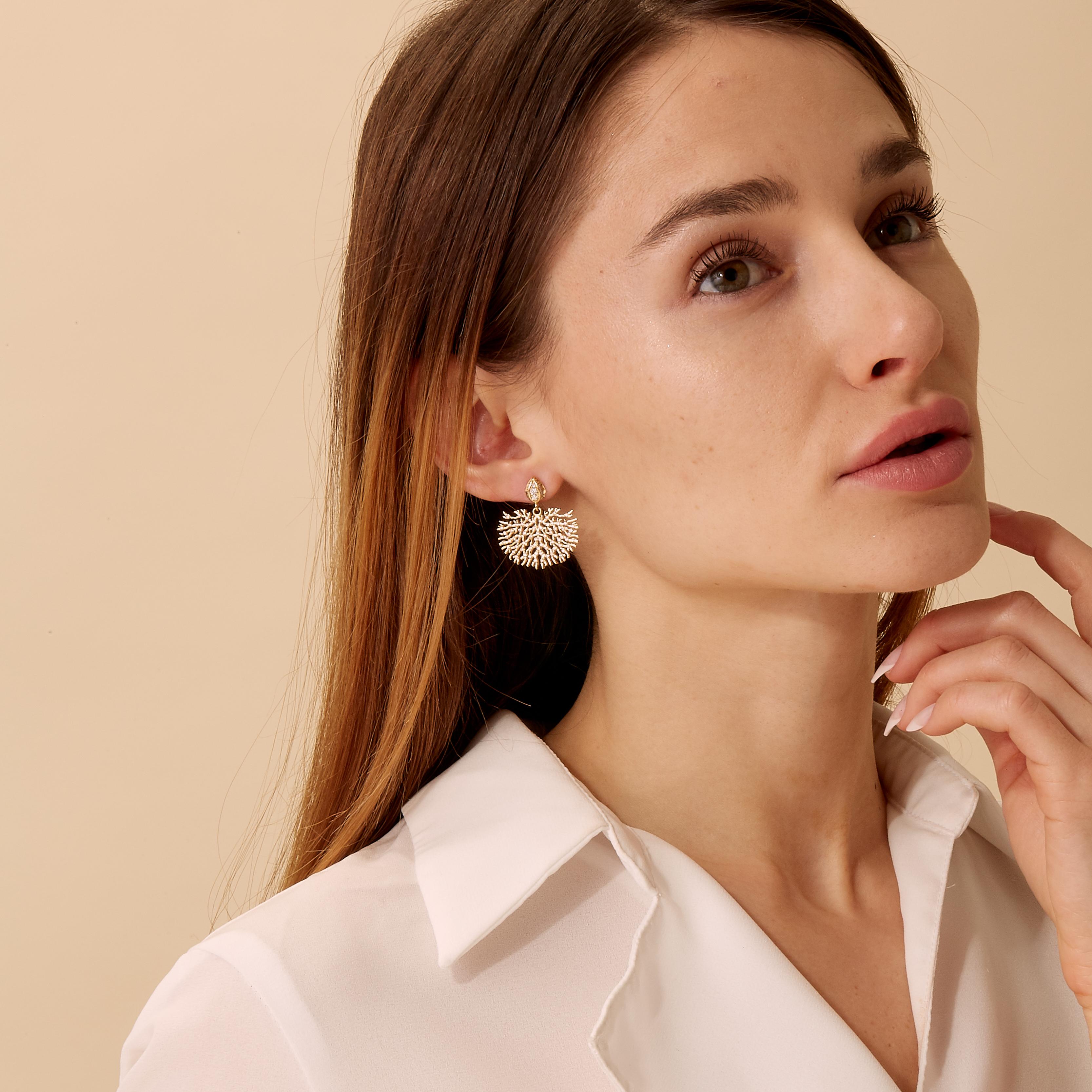 Created in 18 karat gold
Diamonds 1 carat approx.
Limited edition

Adorn yourself with these immaculate Candy Blue Topaz and Moon Quartz earrings crafted in 18 karat gold. Sparkling diamonds weighing around 1 carat enhance the bewitching pair, which
