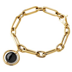 Syna Bracelet en or jaune et onyx noir cosmique