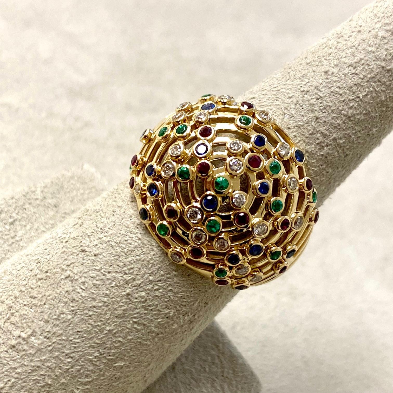 Created in 18 karat yellow gold
Emeralds 0.15 carat approx.
Rubies 0.20 carat approx.
Sapphires 0.18 carat approx.
Champagne diamonds 0.20 carat approx.
Ring size US 7, can be sized up or down
Limited edition

Crafted with 18 karat yellow gold, this