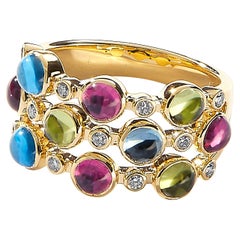 Syna Cosmic Ring aus Gelbgold mit Rubellit, Peridot, blauem Topas und Diamanten