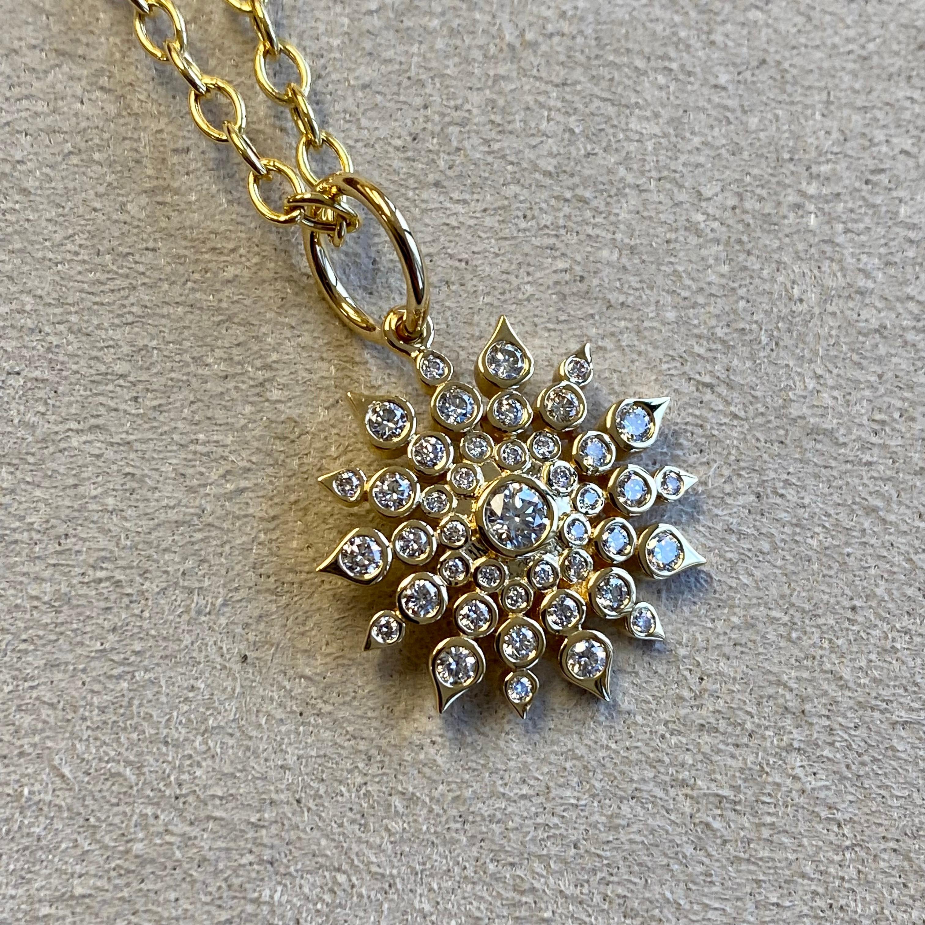 Created in 18kyg
Diamonds 0.60 carat approx.
Chain sold separately

Handcrafted in 18-karat yellow gold, this pendant is adorned with approximately 0.60 carats of diamonds, with the chain to be sold separately.

About the Designers ~ Dharmesh &