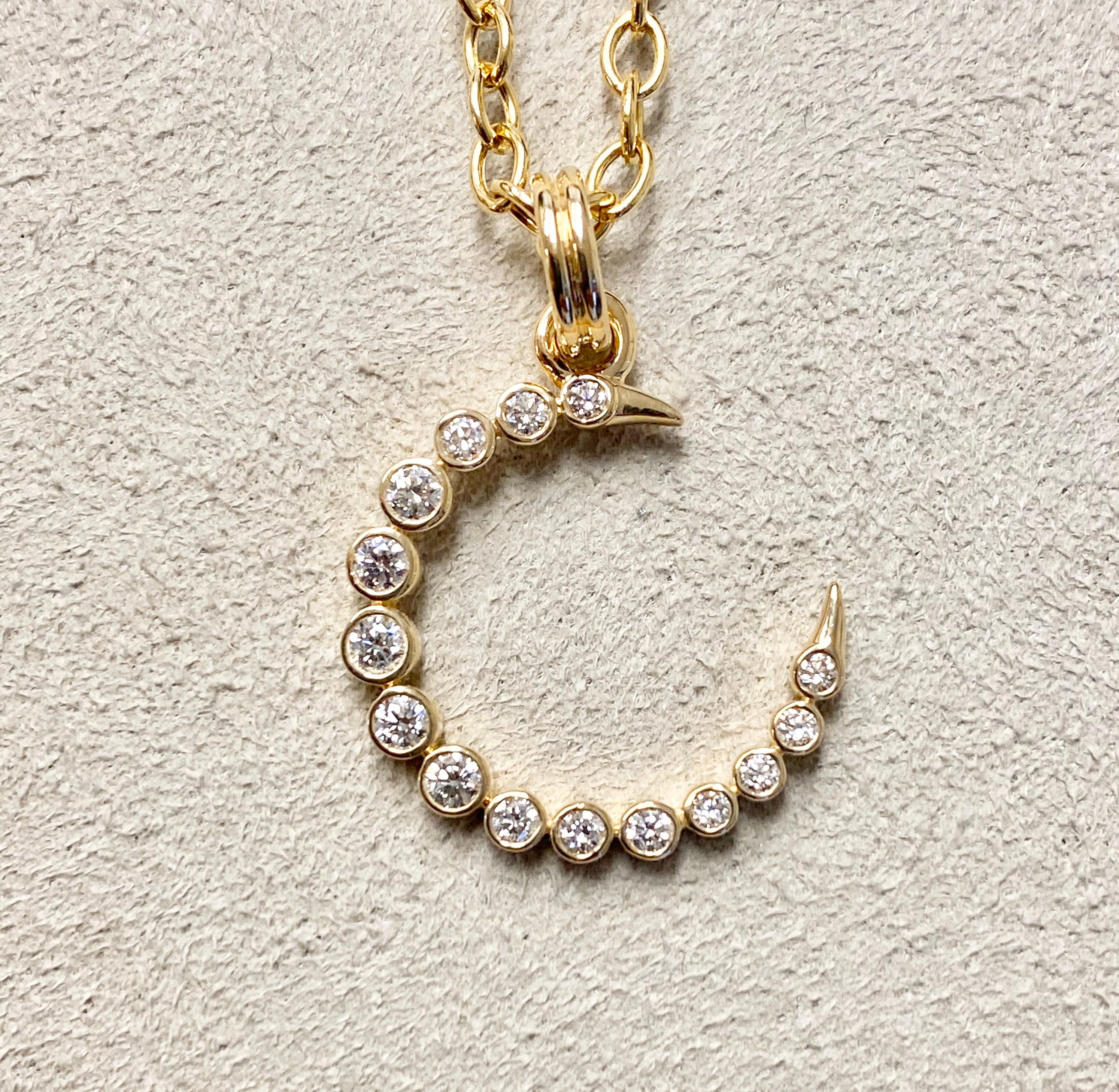 Created in 18 karat yellow gold 
Diamonds 0.30 ct approx
Chain sold separately 

Crafted with 18 karat yellow gold, this pendant features an estimated 0.30 carats of diamonds. The chain is sold separately.

About the Designers ~ Dharmesh &