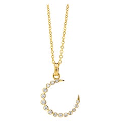 Colgante Media Luna de Oro Amarillo Syna con Diamantes