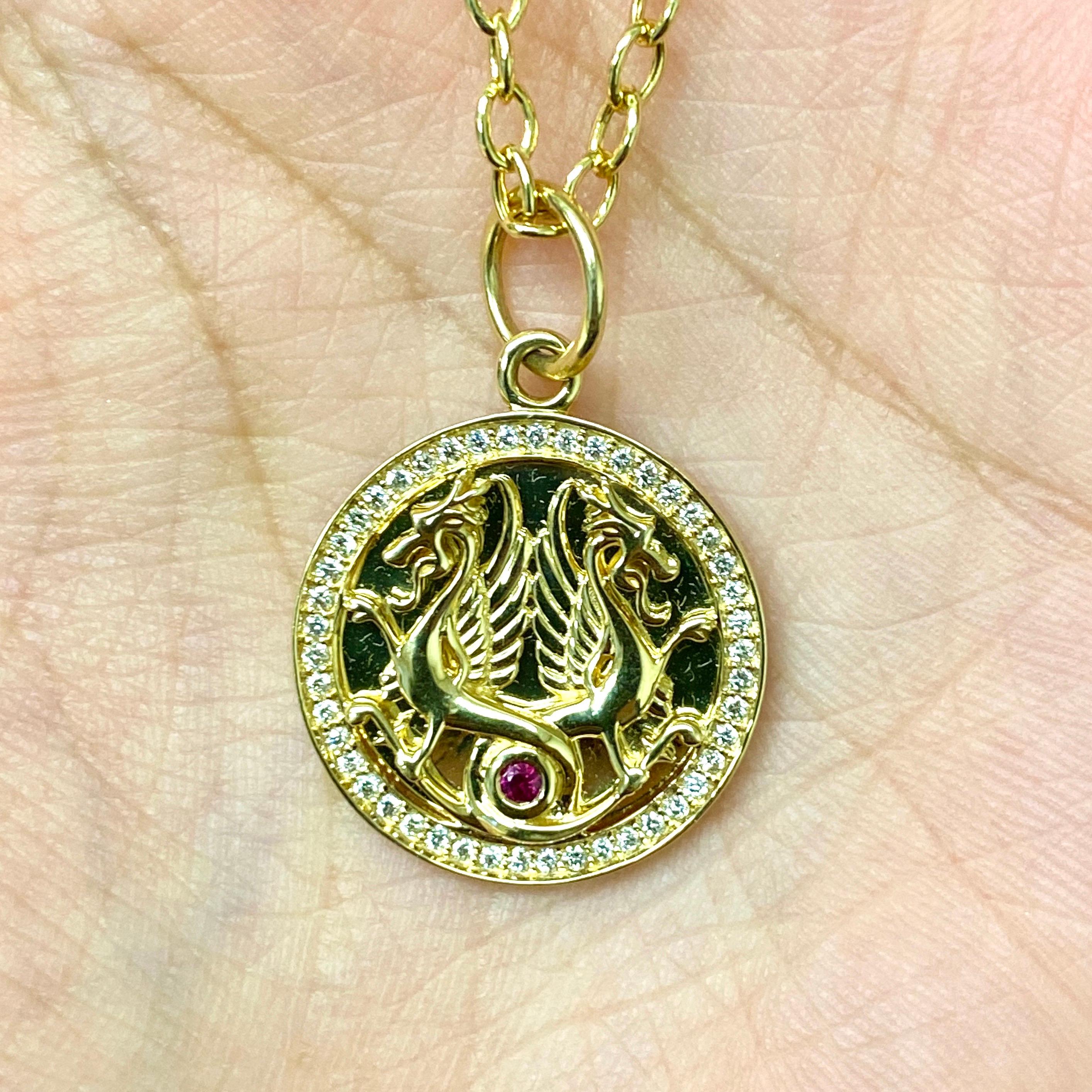 Created in 18 karat yellow gold
Ruby 0.04 ct approx
Diamonds 0.2 ct approx
Chain sold separately
Limited Edition

Exquisite in 18k yellow gold, this limited-edition pendant is adorned with a 0.04ct ruby and 0.2ct of sparkling diamonds. Chain sold