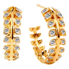 Syna-Ohrringe aus Gelbgold mit Diamanten