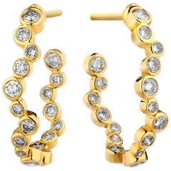 Boucles d'oreilles Syna en or jaune avec diamants champagne
