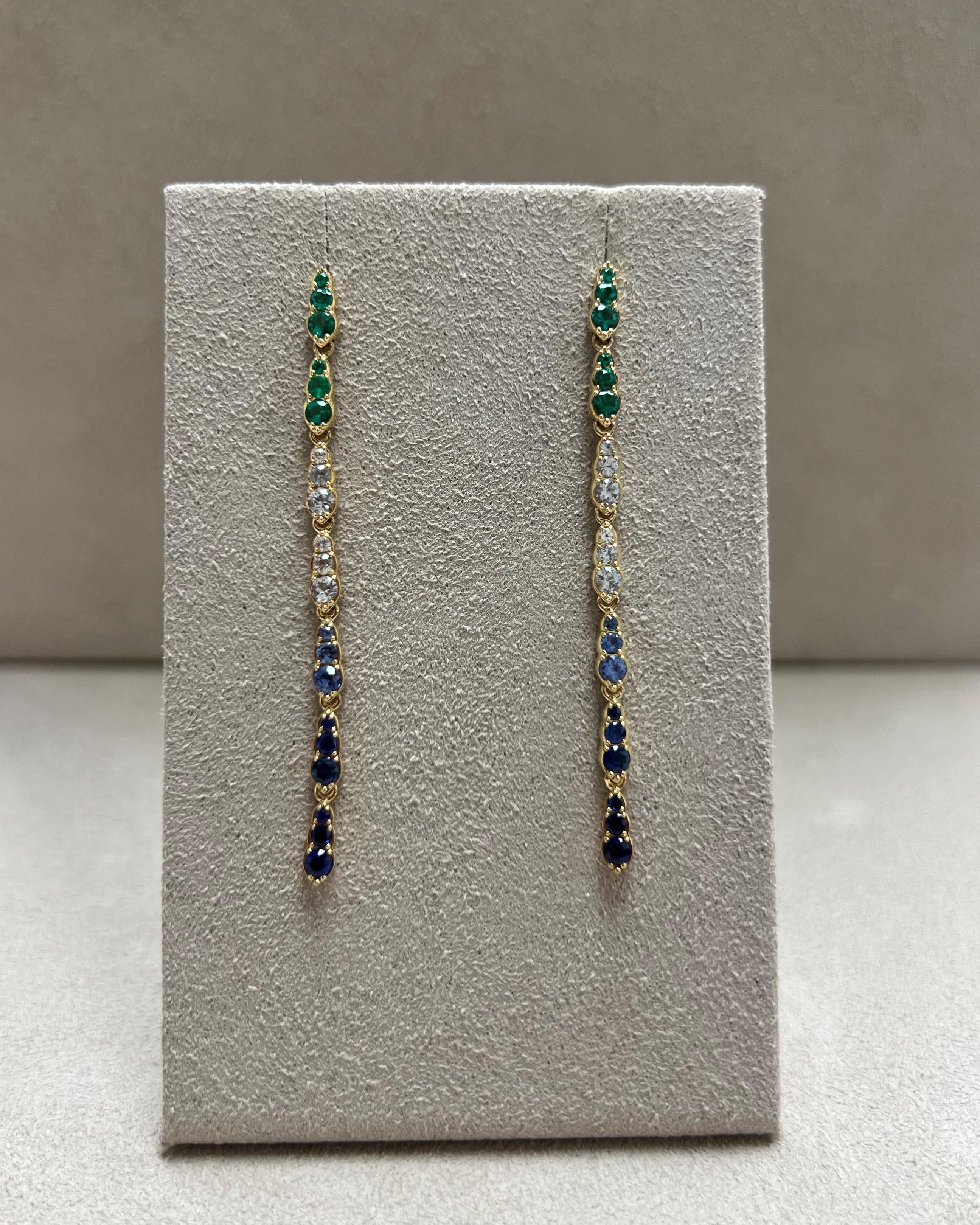 Created in 18 karat yellow gold
Emeralds 0.35 carat approx.
Sapphires 1.30 carats approx.
Post backs for pierced ears
Limited edition

Intricately crafted in 18 carat yellow gold, these limited edition earrings sport brilliant emeralds of 0.35 carat