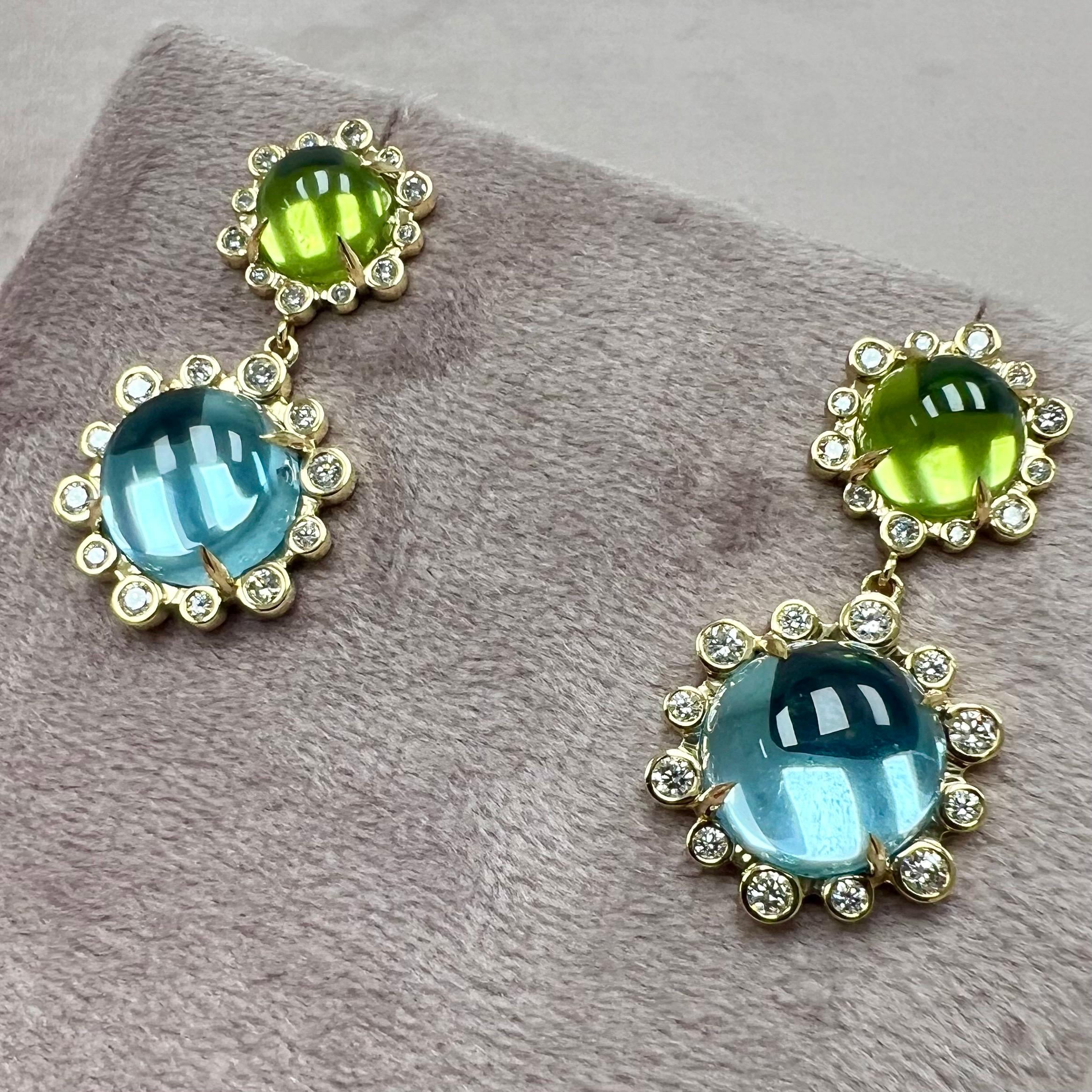 Created in 18 karat yellow gold
Peridot 5.4 carats approx.
Blue Topaz 14 carats approx.
Diamonds 0.80 carat approx.
18kyg Butterfly backs
Limited Edition


About the Designers

Drawing inspiration from little things, Dharmesh & Namrata Kothari have