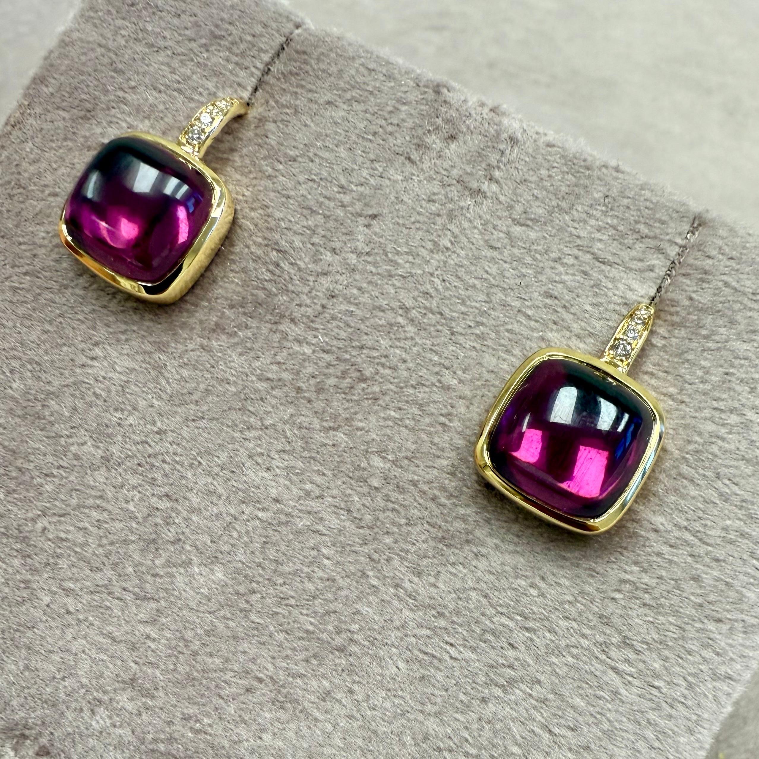 Created in 18 karat yellow gold
Rhodolite Garnet sugarloaf 11 carats approx.
Diamonds 0.05 carat approx.
Limited edition

Handcrafted in 18 karat yellow gold, these exclusive earrings feature a mesmerizing 11-carat rhodolite garnet sugarloaf,