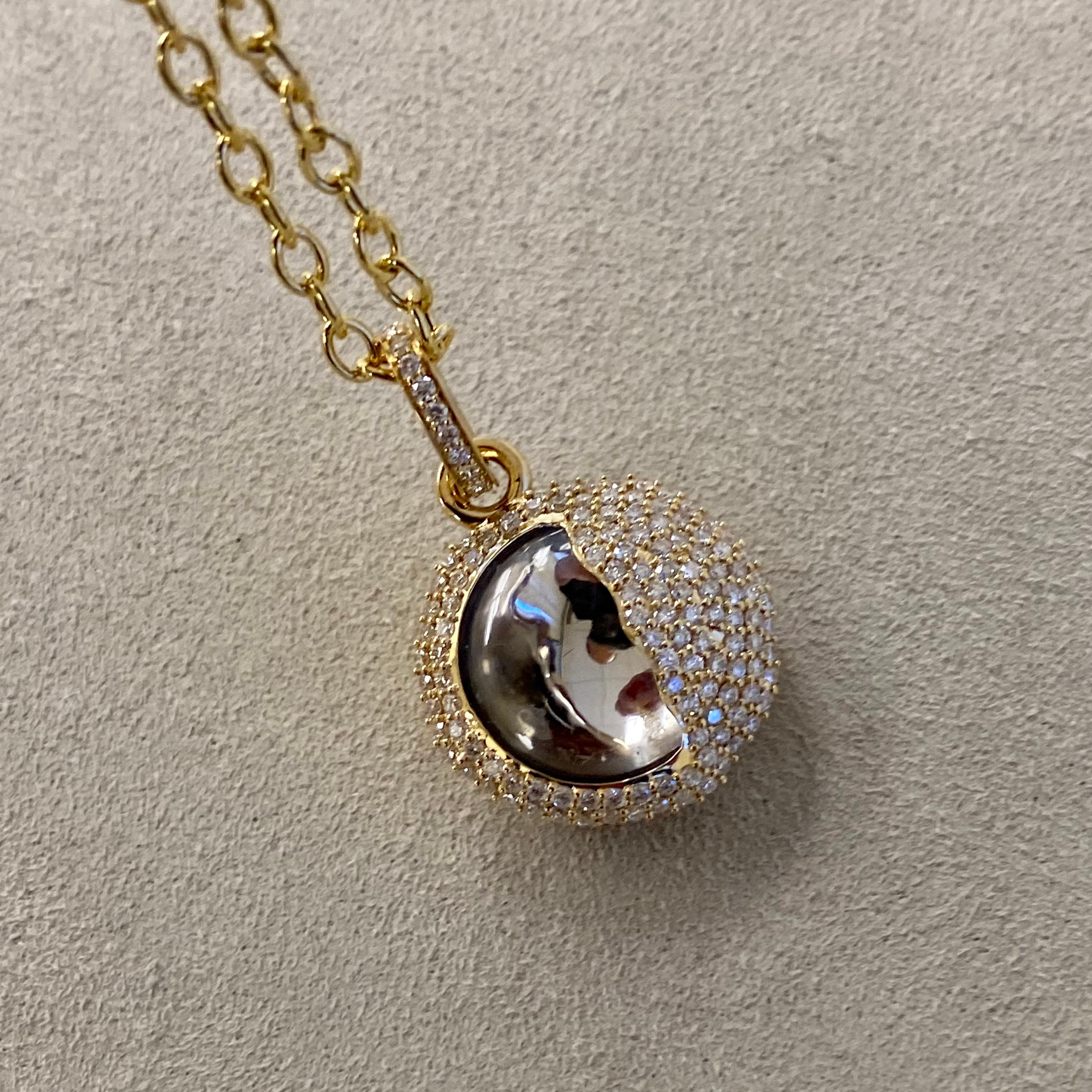 Created in 18 karat yellow gold
Rock Crystal 11 carats approx.
Diamonds 0.80 carat approx.
Chain sold separately
One of a kind

This one-of-a-kind, luxurious pendant is crafted in 18 karat yellow gold, set with a breathtaking 11 carats of rock