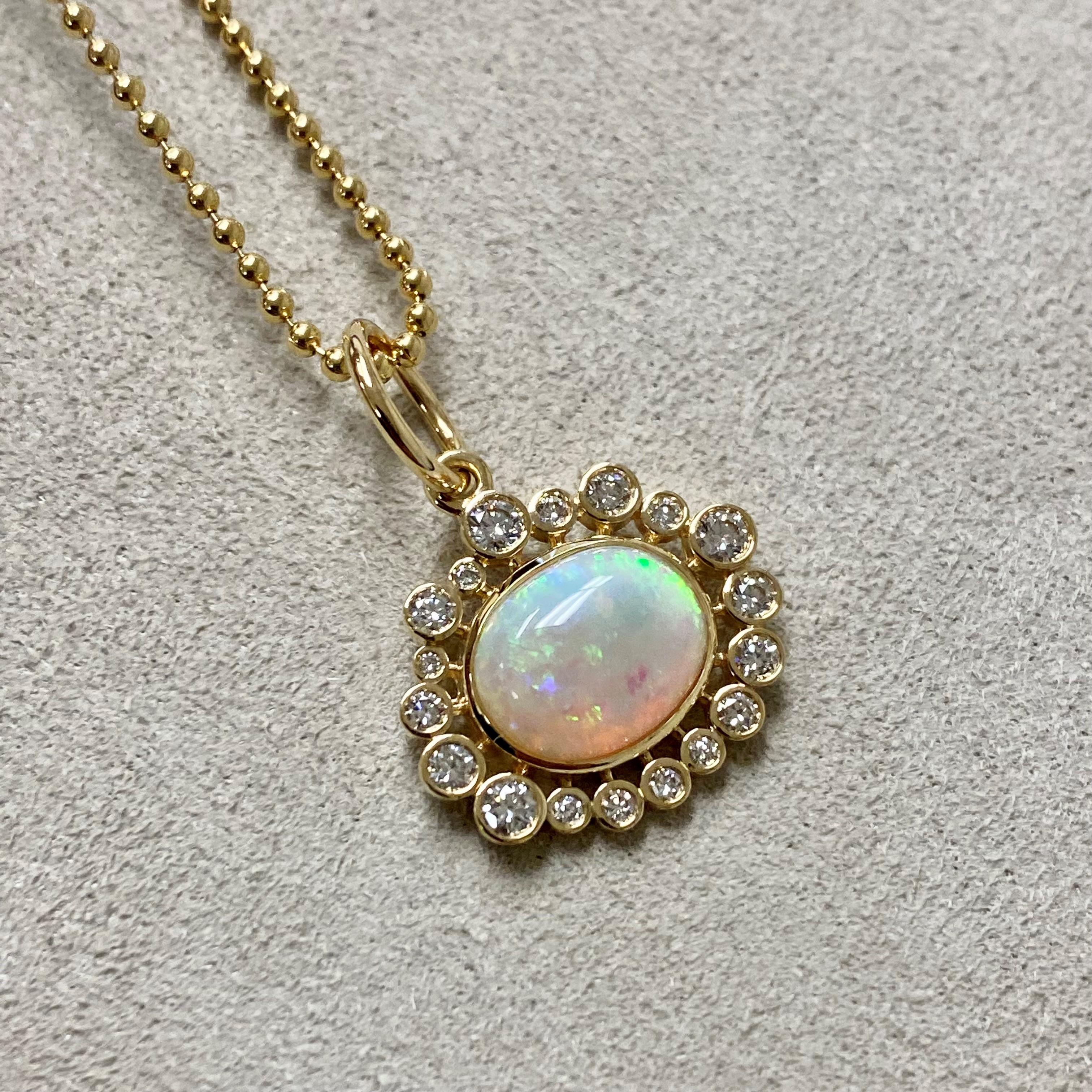 Created in 18 karat yellow gold
Ethiopian opal 1.50 carats approx.
Diamonds 0.40 carat approx.
18 inch necklace with loops at 16th and 17th inch
Lobster clasp

About the Designers ~ Dharmesh & Namrata

Drawing inspiration from little things,