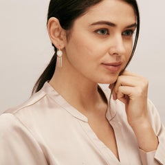 Pendientes de ópalo etíope de oro amarillo Syna con diamantes