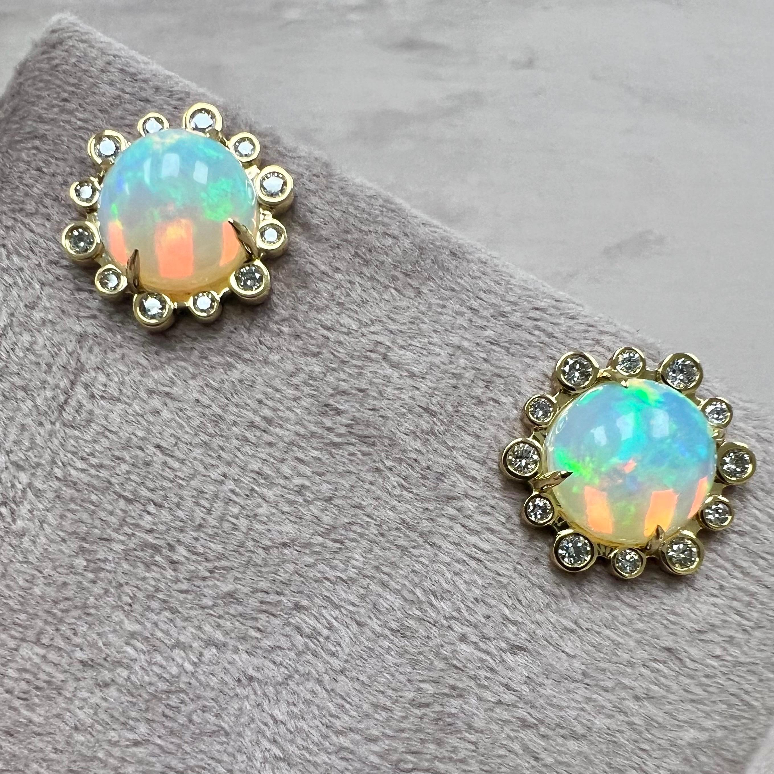 Created in 18 karat yellow gold
Ethiopian Opal 6.50 carats approx.
Diamonds 0.50 carat approx.
Omega backs for pierced ears
Limited edition



About the Designers ~ Dharmesh & Namrata

Drawing inspiration from little things, Dharmesh & Namrata