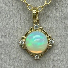 Syna Yellow Gold Ethiopian Opal Pendant with Diamonds