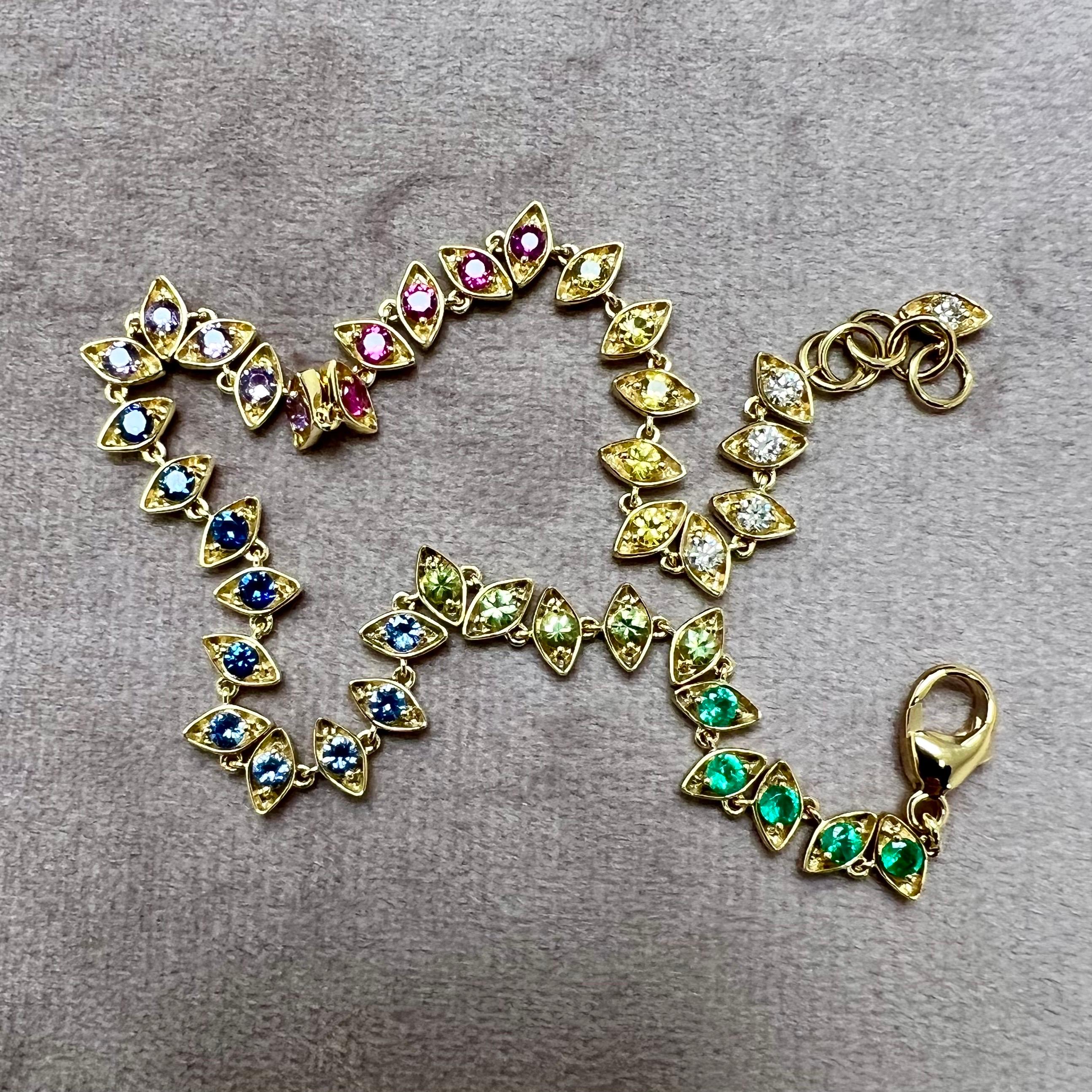 Created in 18 karat yellow gold
Rainbow Sapphires 2.20 carats approx.
Emeralds 0.30 carat approx.
Diamonds 0.30 carat approx.
8.5 inch length
18 karat yellow gold lobster clasp
Bracelet can be clasped at any length



About the Designers ~ Dharmesh