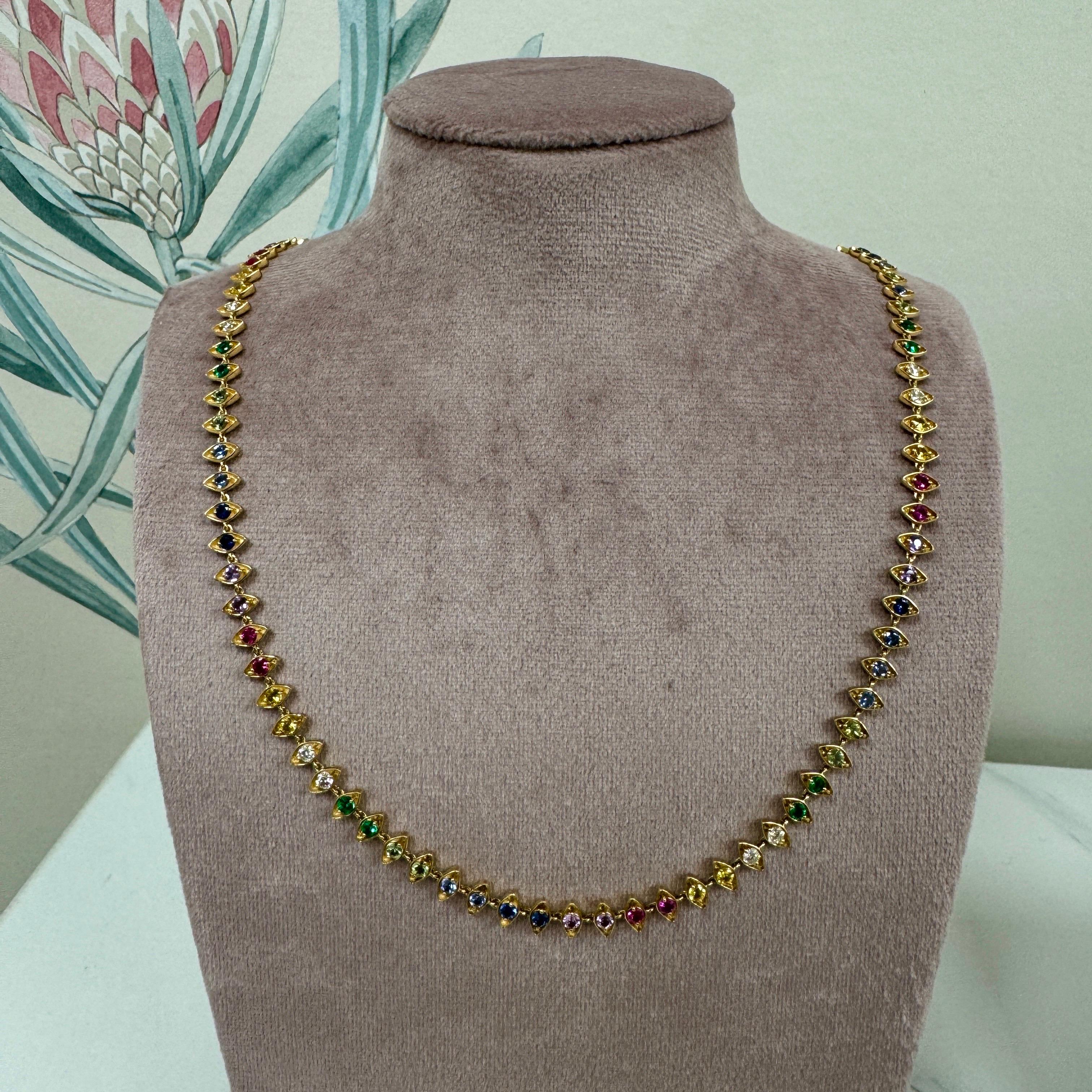 Contemporary Syna Yellow Gold Evil Eye Necklace with Rainbow Sapphires, Emeralds and Diamonds For Sale