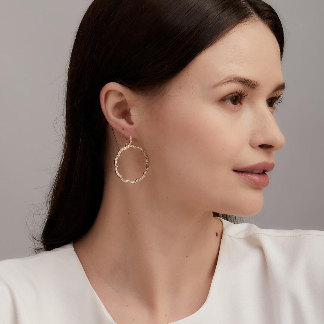Created in 18 karat yellow gold
Diamonds 1 carat approx.
French wire for pierced ears

Enhance your look with these luxurious Cosmic Gemstone Dangle Earrings. Handcrafted from elegant 18 karat yellow gold and boasting diamonds totaling 1 carat,