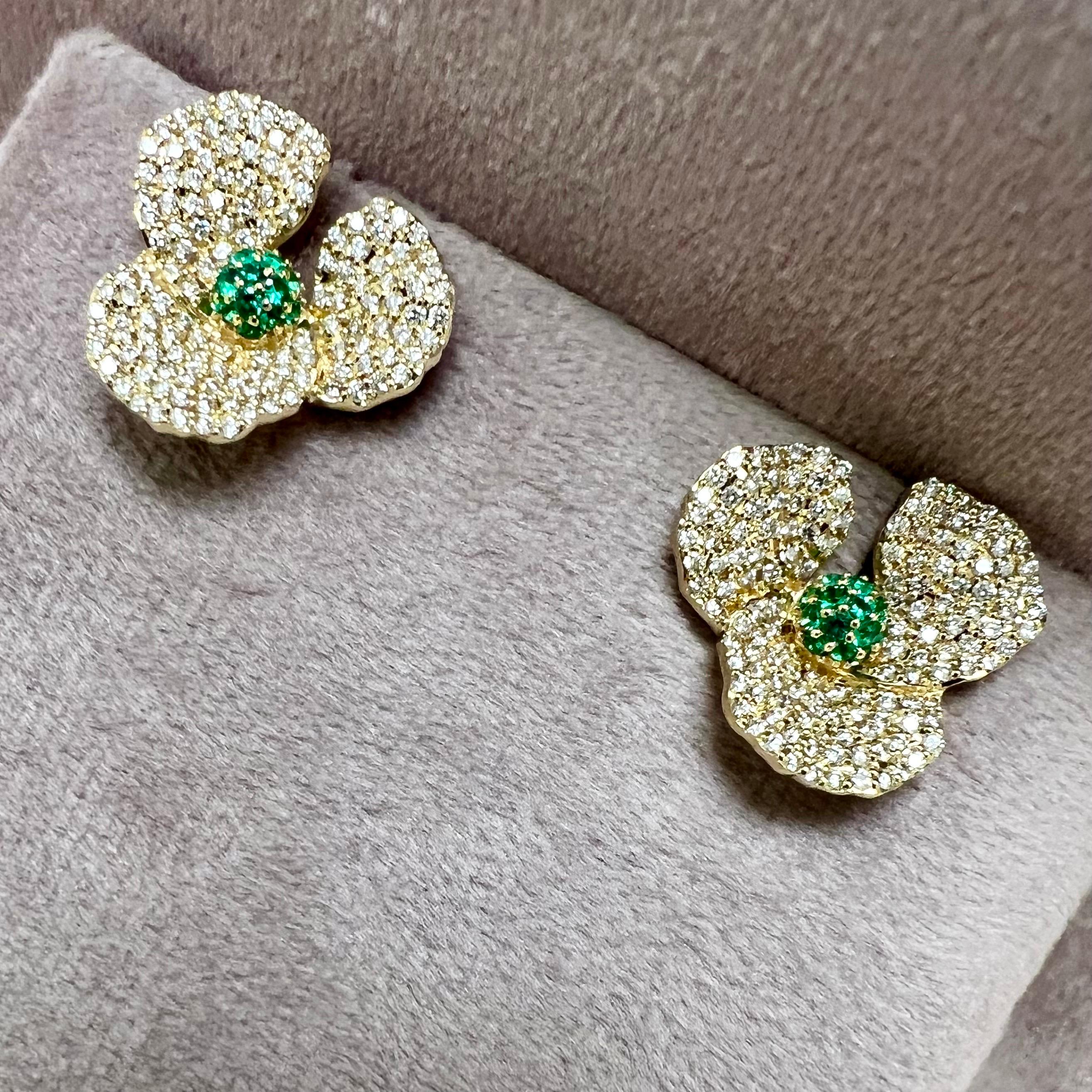 Created in 18 karat yellow gold
Emeralds 0.30 carat approx.
Diamonds 1.50 carats approx.
18kyg butterfly backs
Can be worn at different angles
Limited edition

Crafted with 18 karat yellow gold, these limited edition earrings feature emeralds (at