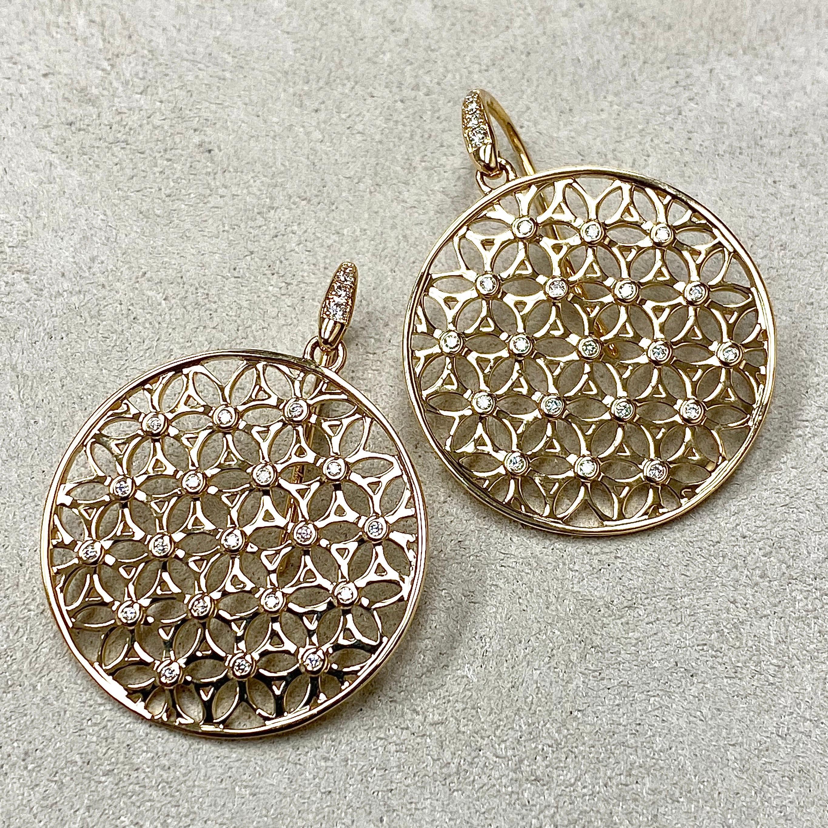 Created in 18 karat yellow gold
Flower of life motif
Diamonds 0.20 ct approx
Limited edition

These Candy Blue Topaz & Diamond Earrings are an exquisite luxury piece crafted with precision and care. Featuring a limited edition design in 18 Karat
