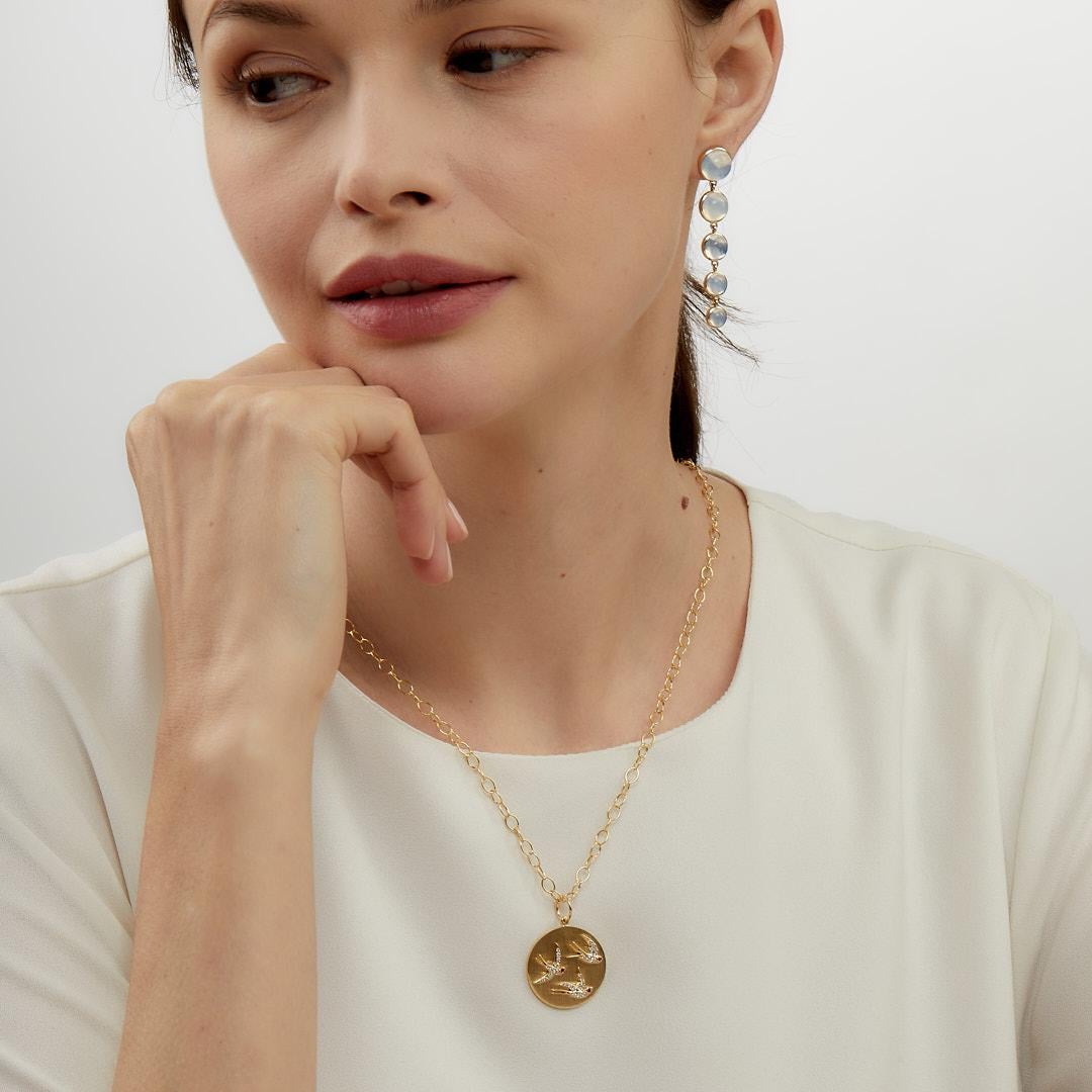 Created in 18 karat yellow gold
Rubies 0.04 carat approx.
Champagne diamonds 0.20 carat approx.
Limited edition
Chain sold separately

 About the Designers ~ Dharmesh & Namrata

Drawing inspiration from little things, Dharmesh & Namrata Kothari have