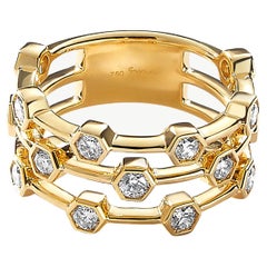 Geometrischer Syna-Ring aus Gelbgold mit Diamanten