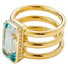 Syna Bague en or jaune avec topaze géométrique bleue et diamants