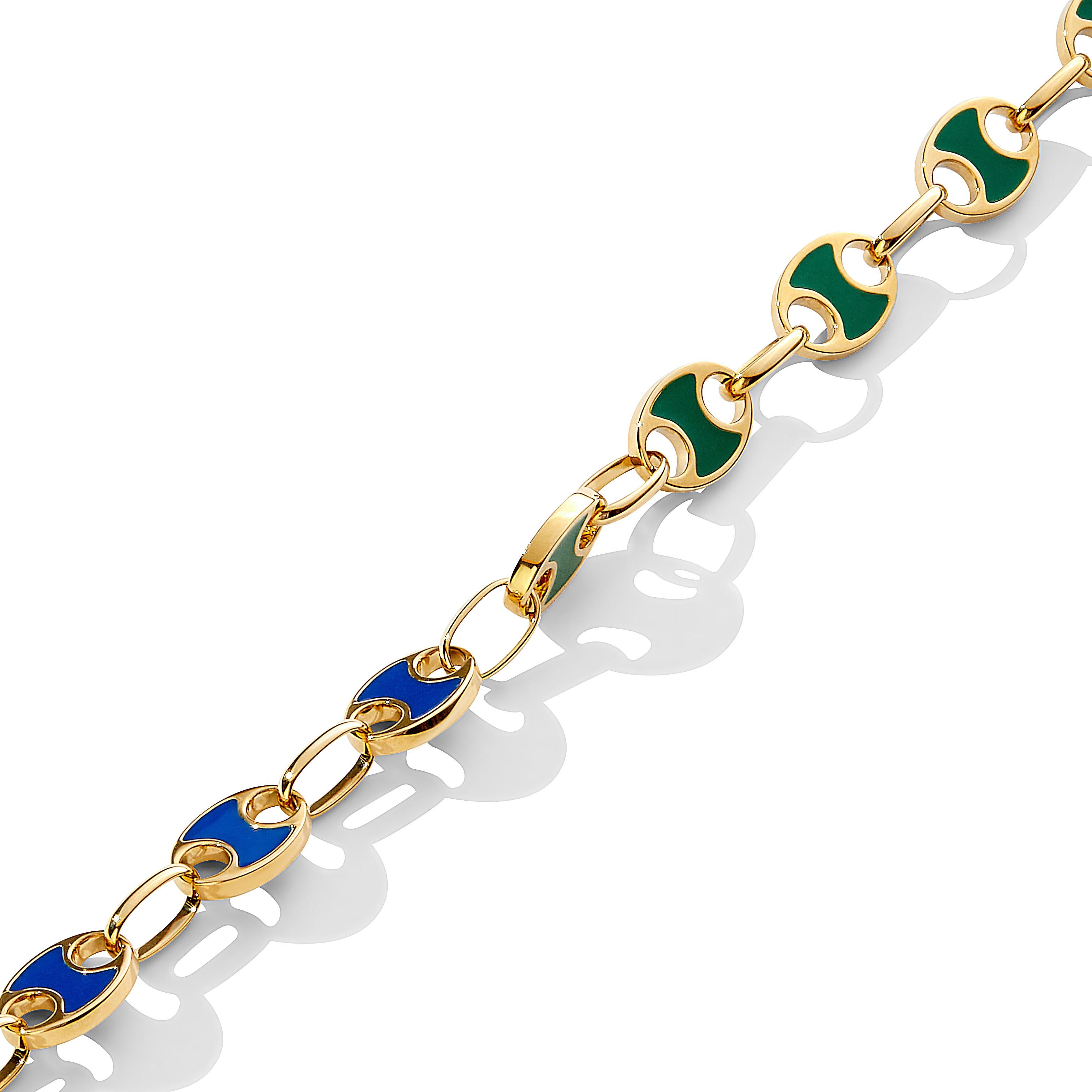 Created in 18 karat yellow gold
Length 8 inches
Emerald green and lapis blue enamel 
18kyg lobster lock with sizing rings

Exquisitely crafted in 18 karat yellow gold, this 8-inch bracelet shimmers with emerald green and lapis blue enamel, and its