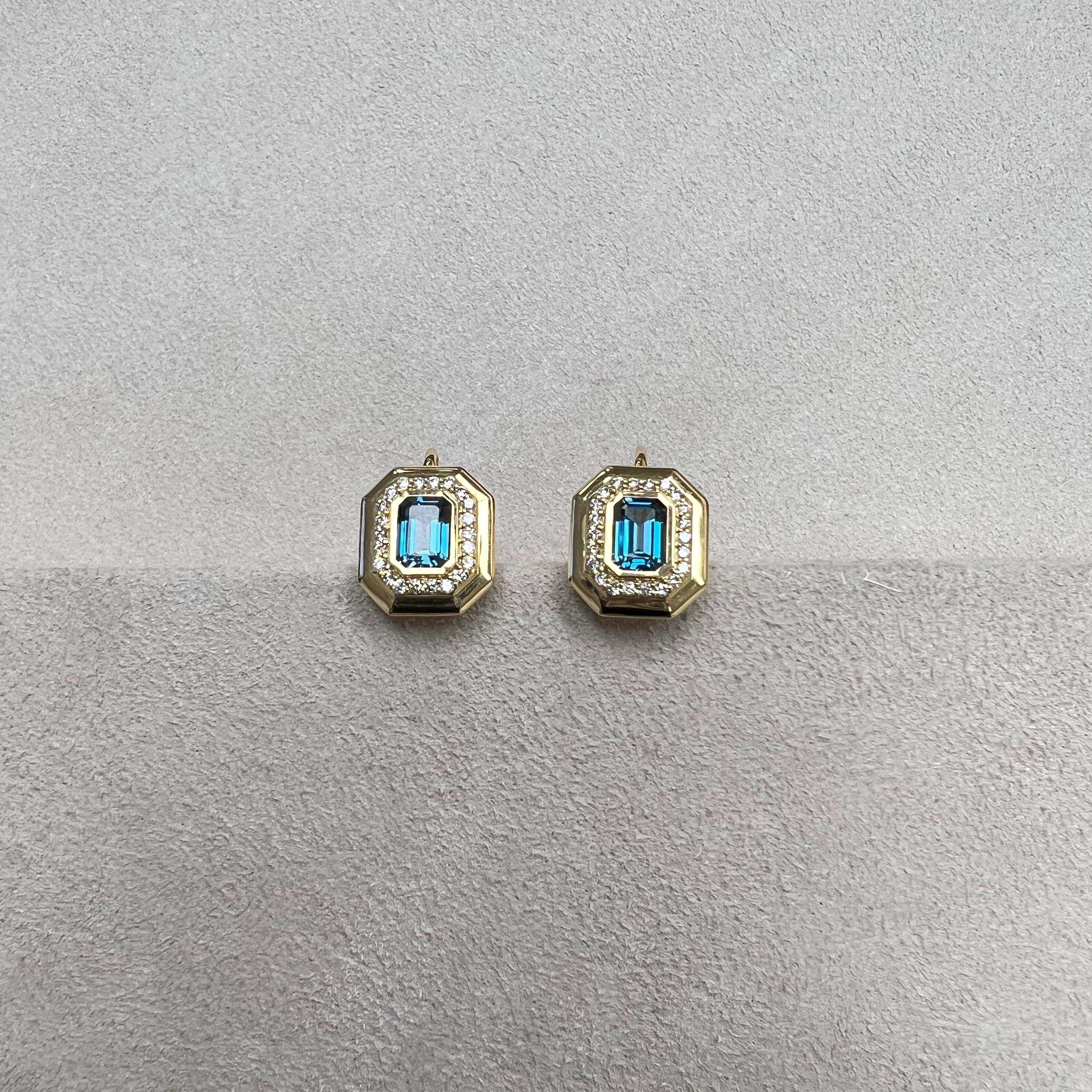 Created in 18 karat yellow gold
London blue topaz 2 carats approx.
Diamonds 0.45 carat approx.
French wire for pierced ears
Limited edition

Wrap yourself in a timeless symbol of power with the Chakra Long Necklace. Created from 18 karat yellow