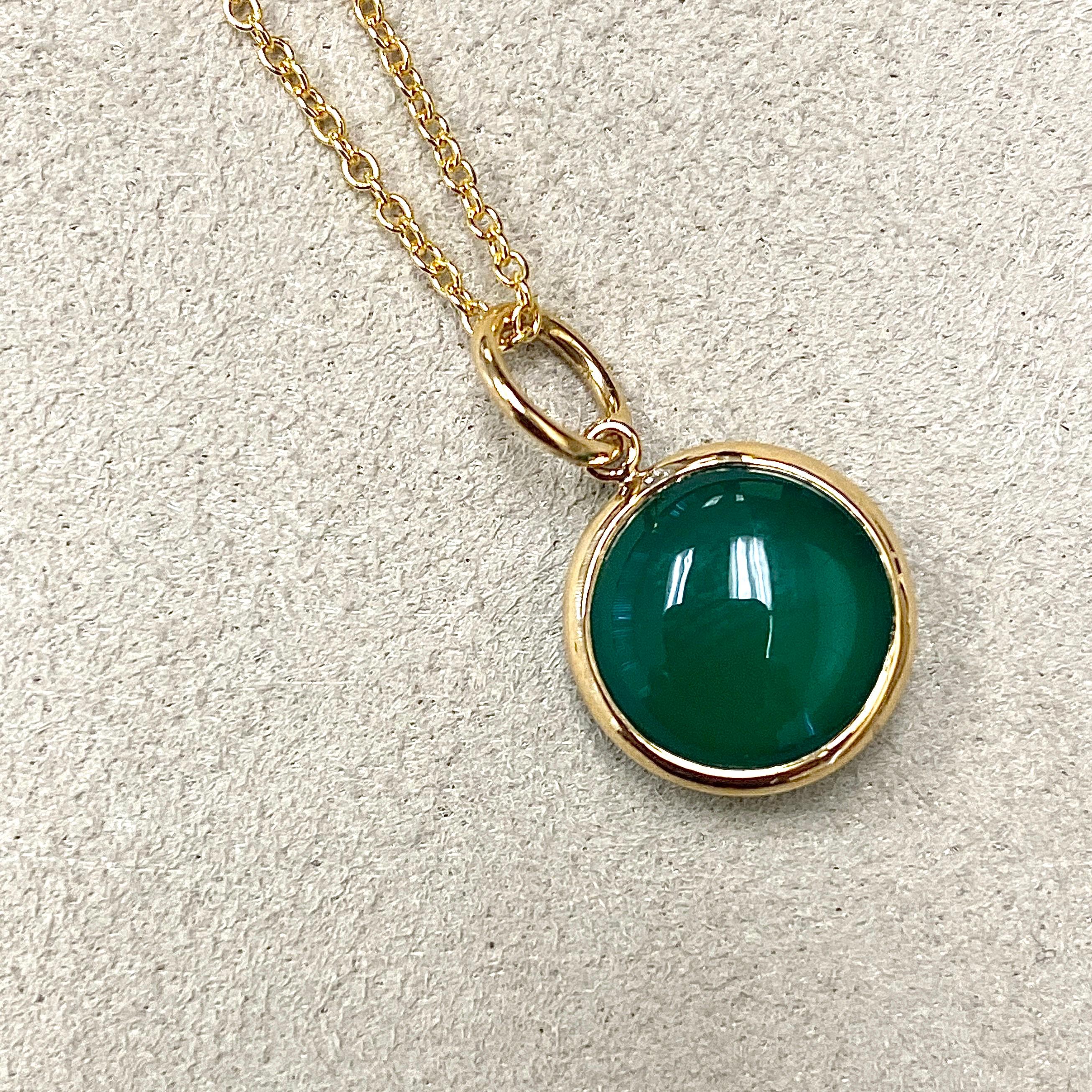 Created in 18 karat yellow gold
10 mm size charm
Green Chalcedony 3.5 cts approx
Chain sold separately 

Crafted from 18 karat yellow gold and measuring 10mm in size, this decadent pendant is adorned with a beautiful aquamarine gemstone weighing