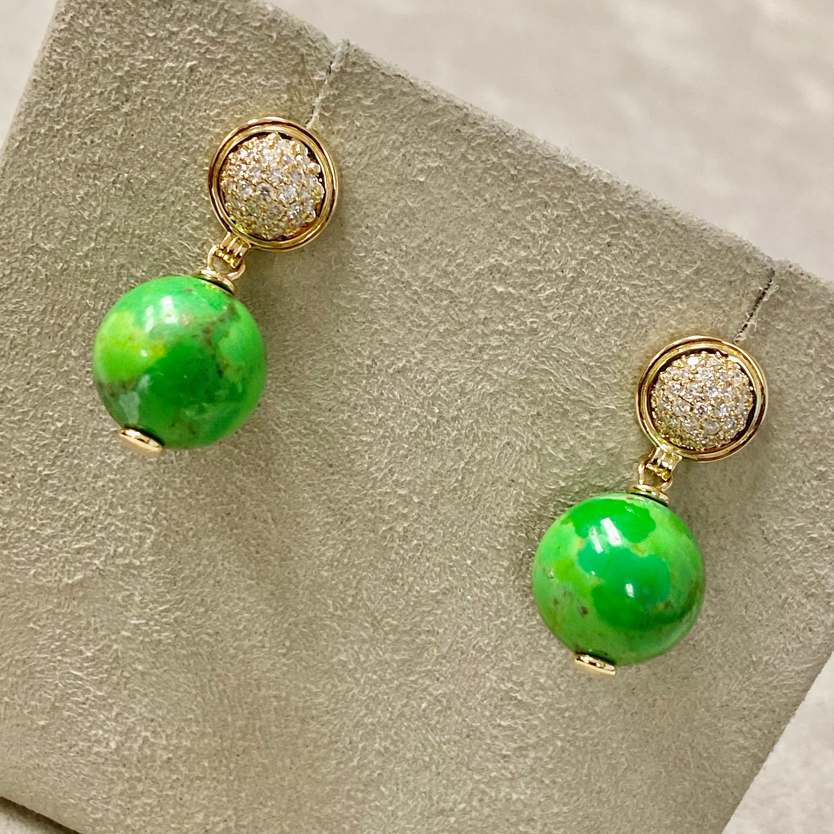 Created in 18 karat yellow gold
Green Turquoise 21 carats approx.
Diamonds 0.4 carat approx.
18kyg butterfly backs
Limited edition

Exquisitely crafted in 18 karat yellow gold, these limited-edition earrings are graced with striking green turquoise