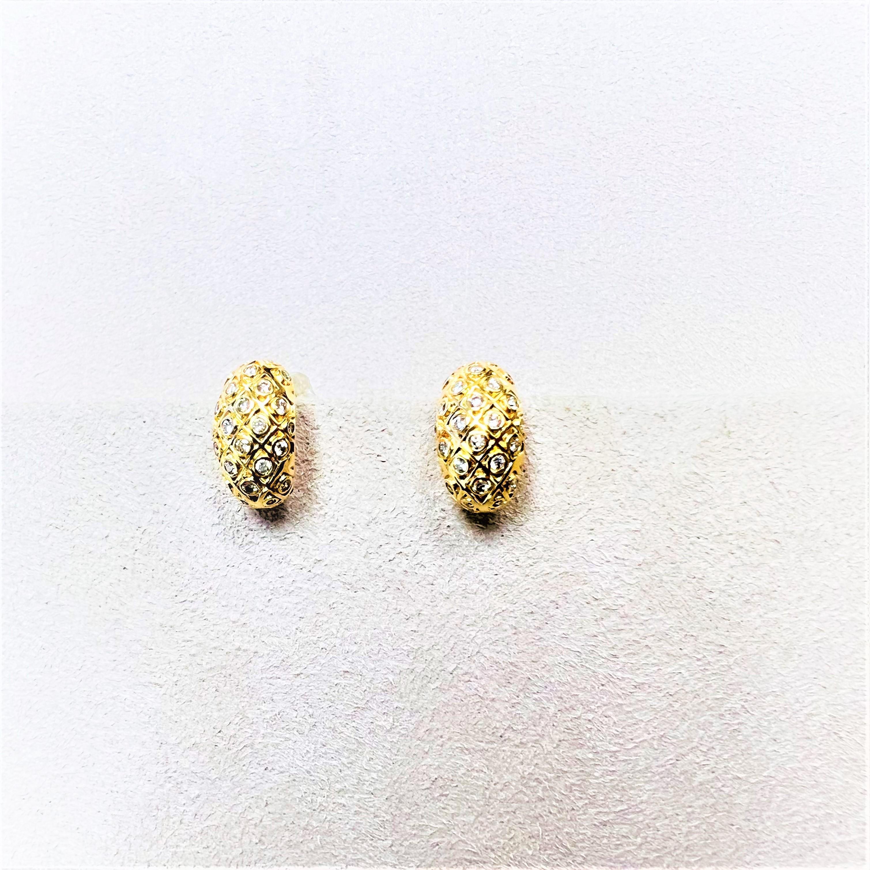 Created in 18 karat yellow gold
Diamonds 0.45 carat approx.
18 kyg butterfly backs
Limited edition

These exquisite Candy Blue Topaz and Lemon Quartz Sugarloaf Earrings bring luxury and sophistication to any ensemble. Crafted in 18 karat yellow gold