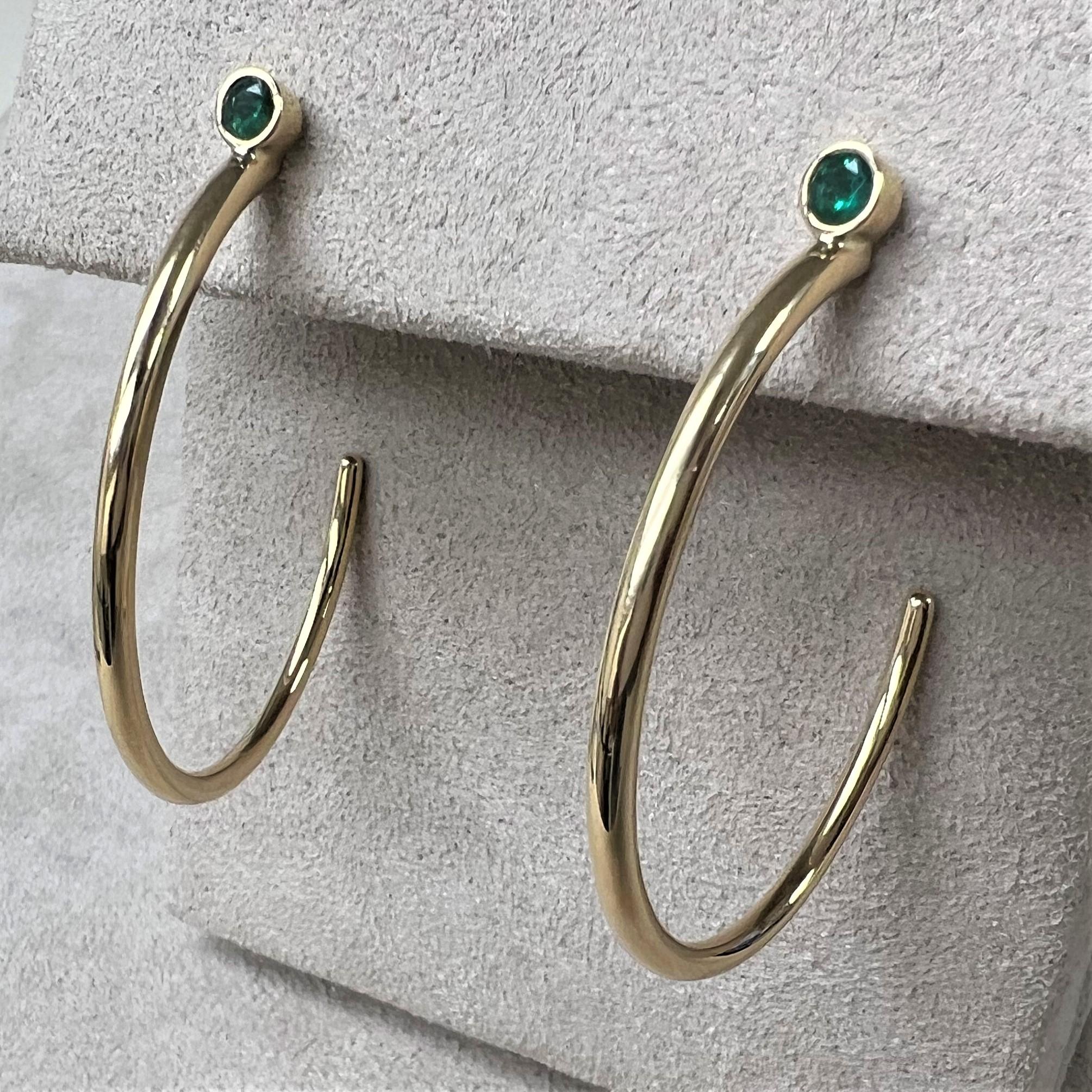 Contemporary Syna Yellow Gold Hoops with Emeralds For Sale