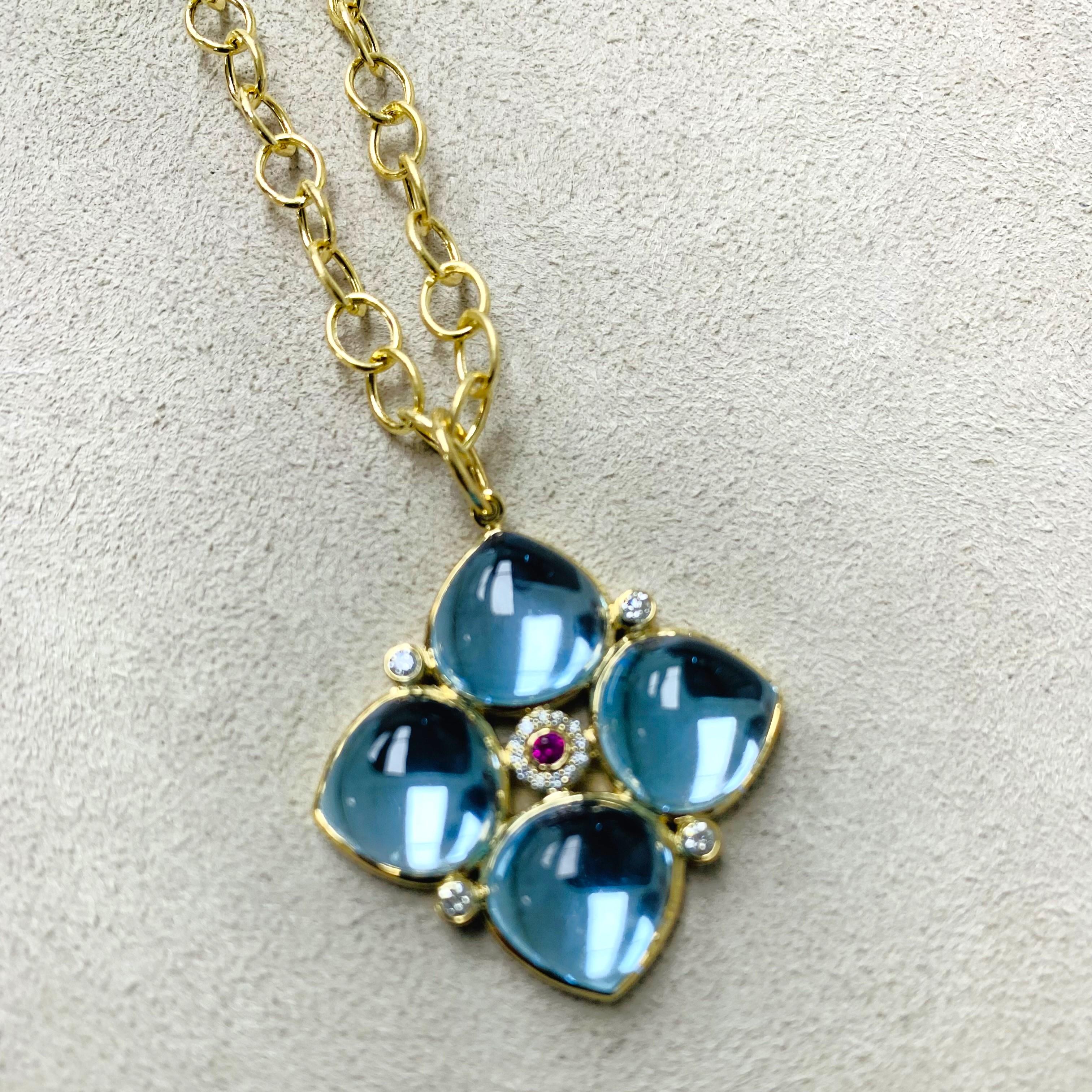 Created in 18 karat yellow gold
Blue topaz 31 carats approx.
Ruby 0.05 carat approx.
Diamonds 0.20 carat approx.
Chain sold separately 
Limited edition

Expertly crafted in 18 karat yellow gold, this exquisite Jardin Blue Topaz Pendant dazzles with