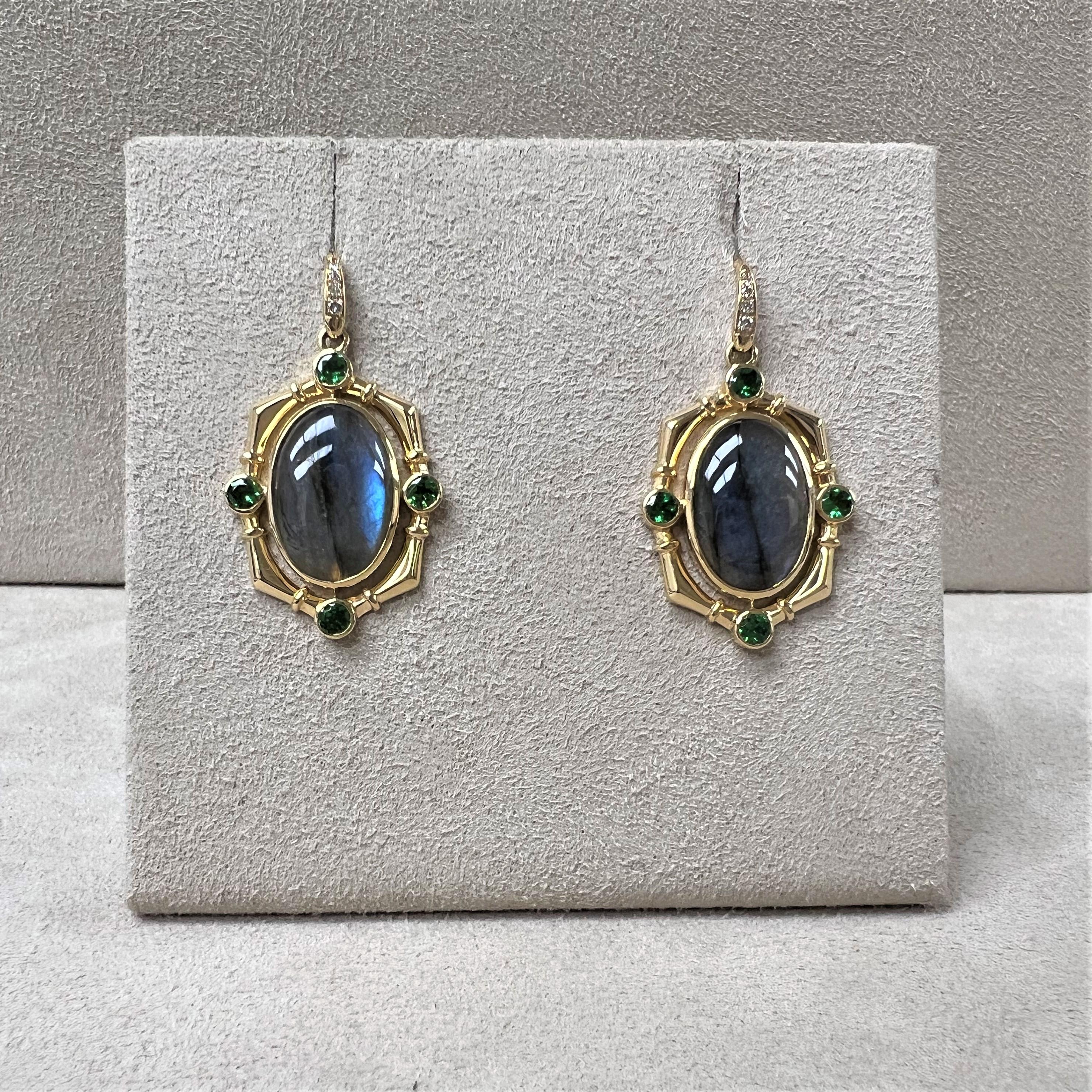 Created in 18 karat yellow gold
Labradorite 8 carats approx.
Tsavorites 0.70 carat approx.
Diamonds 0.05 carat approx.
French wire for pierced ears



About the Designers

Drawing inspiration from little things, Dharmesh & Namrata Kothari have