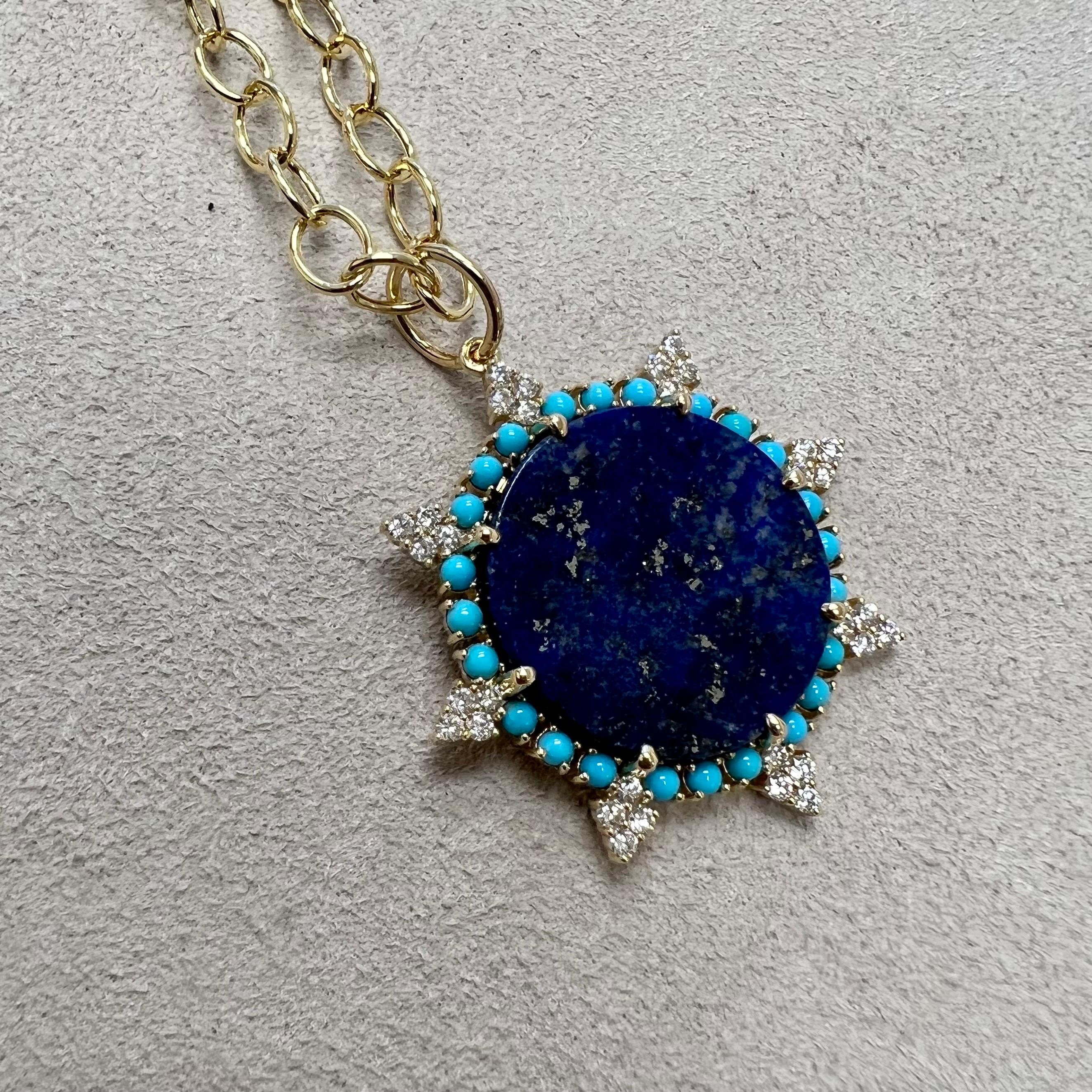 Created in 18 karat yellow gold
Lapis lazuli 9.50 carats approx.
Turquoise 1 carat approx.
Diamonds 0.50 carat approx.
Chain sold separately 
Limited edition

Handcrafted in rich 18-karat yellow gold, this exclusive edition pendant features a