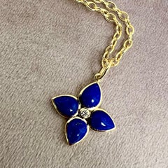 Pendentif fleur Syna en or jaune, lapis-lazuli et diamants