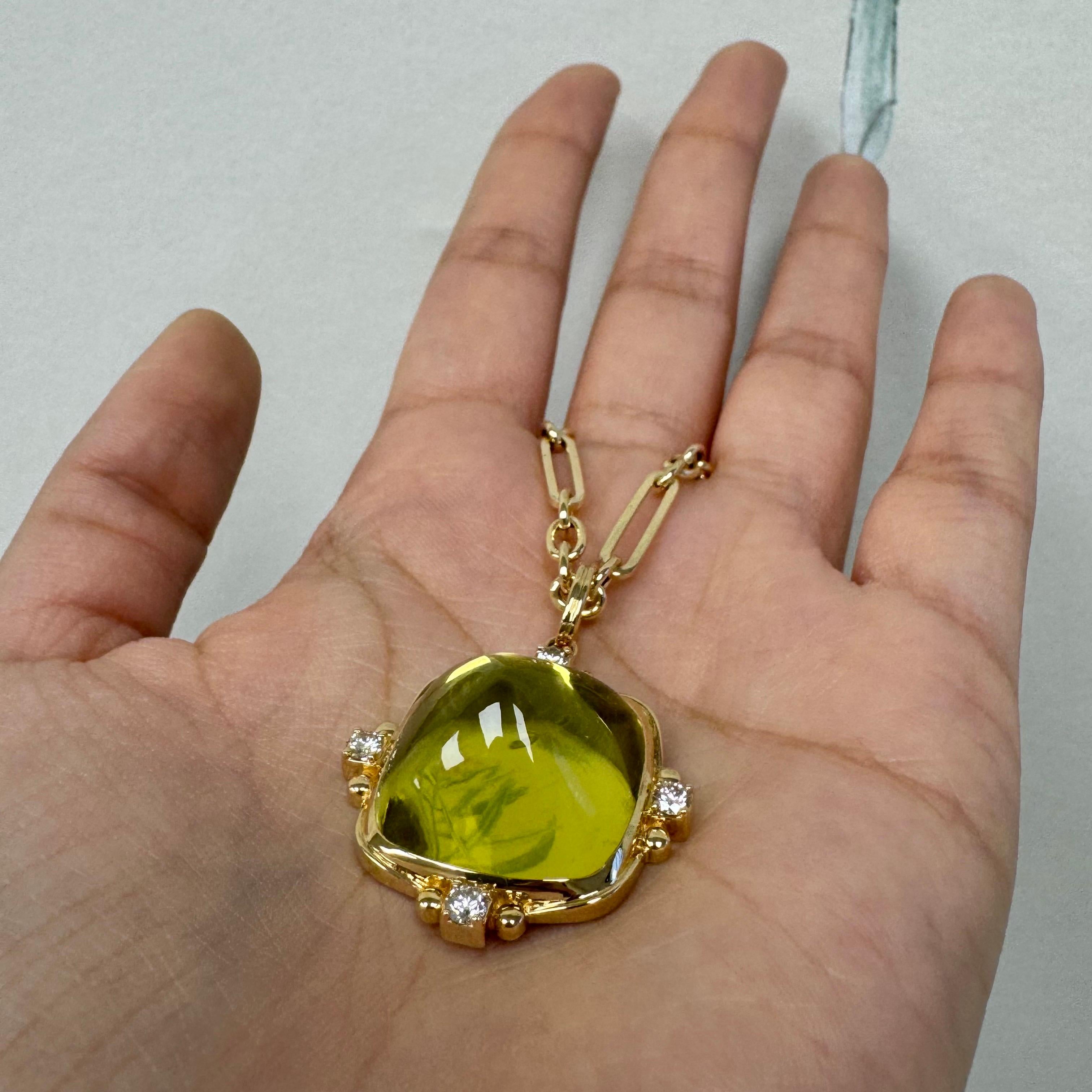 Created in 18 karat yellow gold
Lemon Quartz 32 carats approx.
Diamonds 0.40 carat approx.
Chain sold separately



 About the Designers ~ Dharmesh & Namrata

Drawing inspiration from little things, Dharmesh & Namrata Kothari have created an