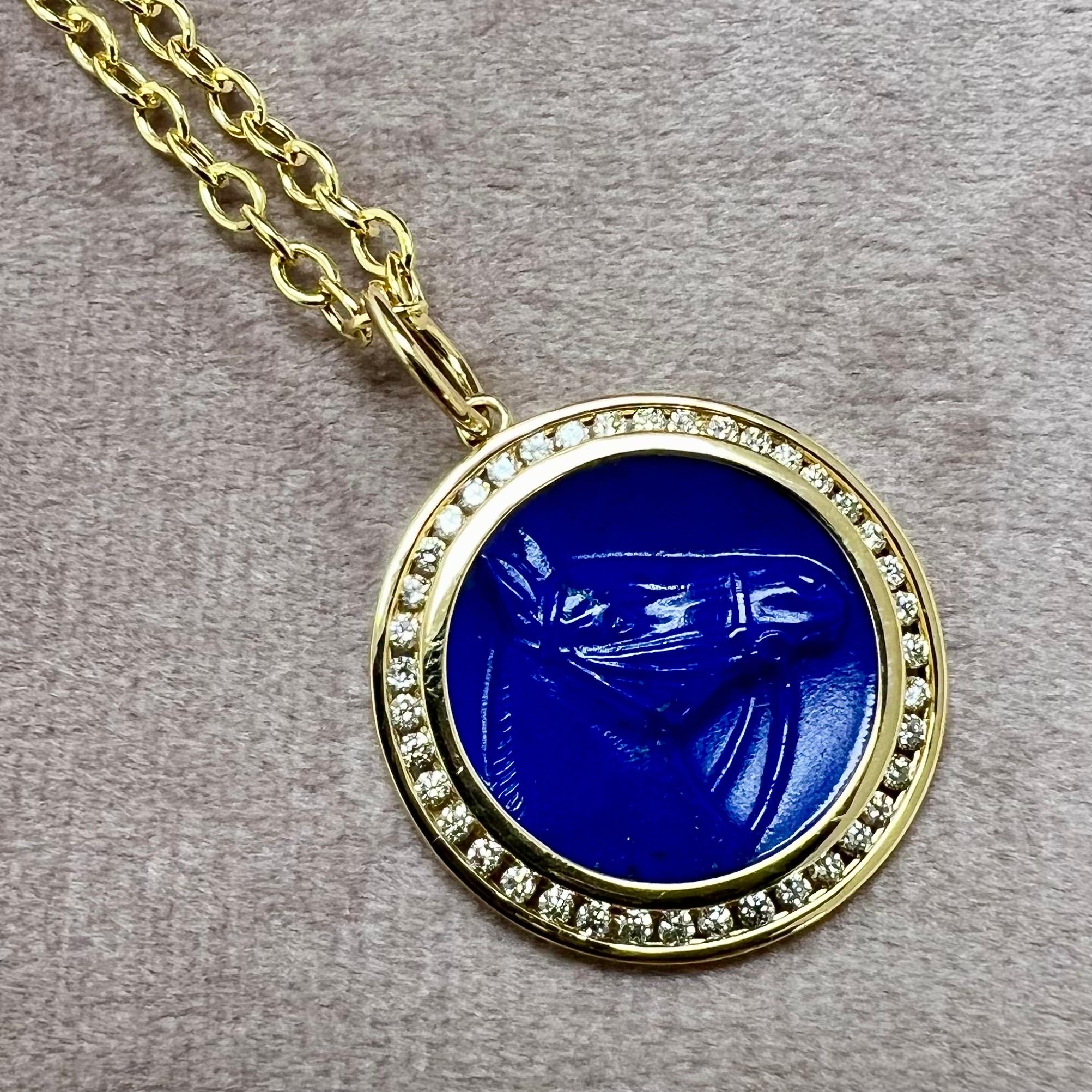Created in 18 karat yellow gold
Lapis Lazuli 6 carats approx.
Diamonds 0.40 carat approx.
Chain sold separately 
Limited edition


About the Designers ~ Dharmesh & Namrata

Drawing inspiration from little things, Dharmesh & Namrata Kothari have