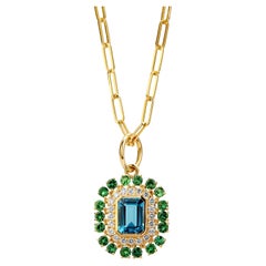 Syna Pendentif London Blue Topaz and Tsavorites en or jaune avec diamants
