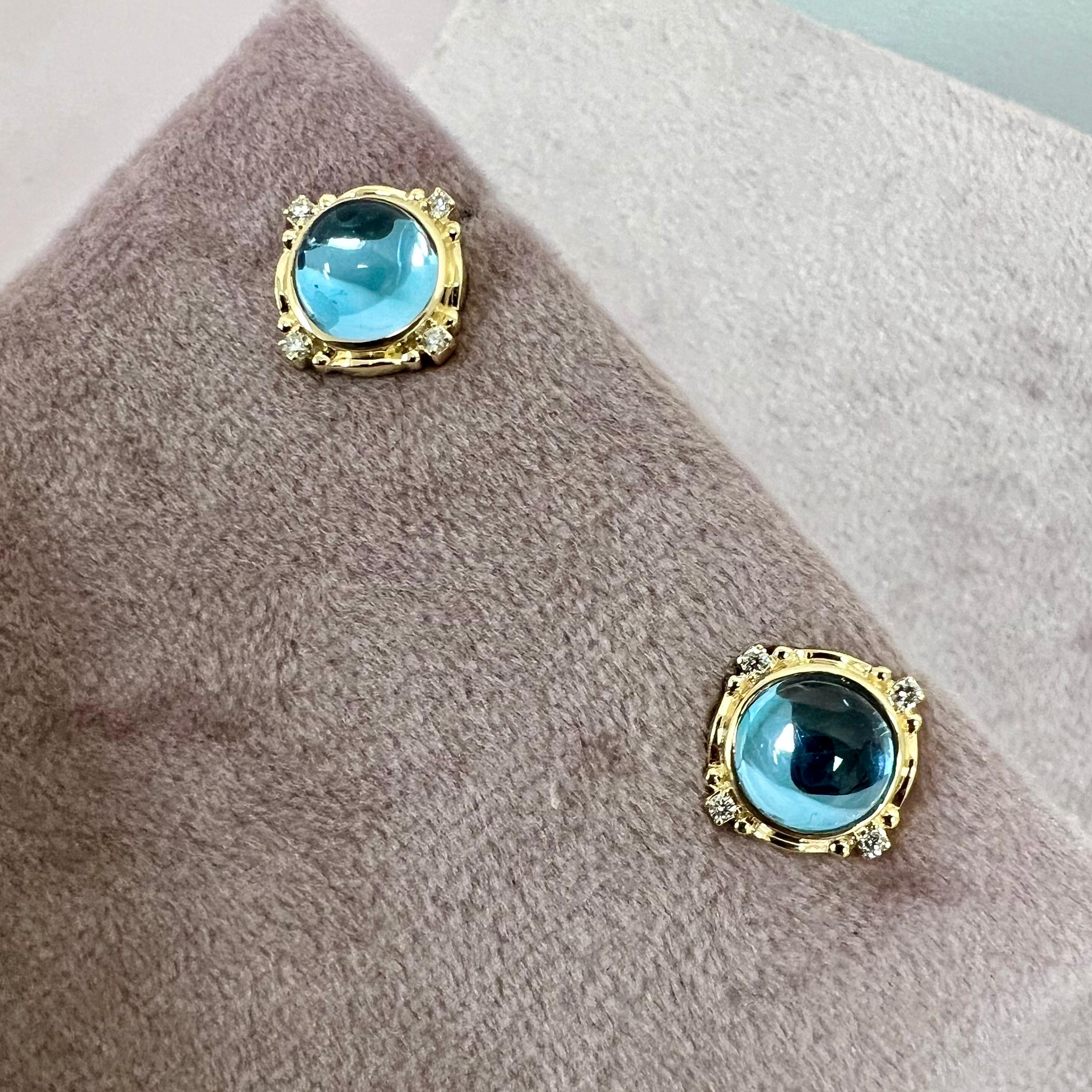 Created in 18 karat yellow gold
London blue topaz 6 carats approx.
Diamonds 0.09 carat approx.
Post backs for pierced ears
Limited edition

These exquisite, limited edition earrings, crafted in 18 karat yellow gold, showcase a dazzling combination