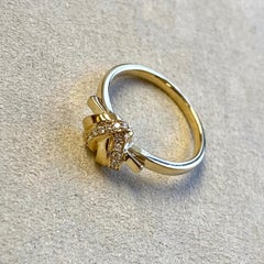 Syna Yellow Gold Love Knot Ring with Champagne Diamonds