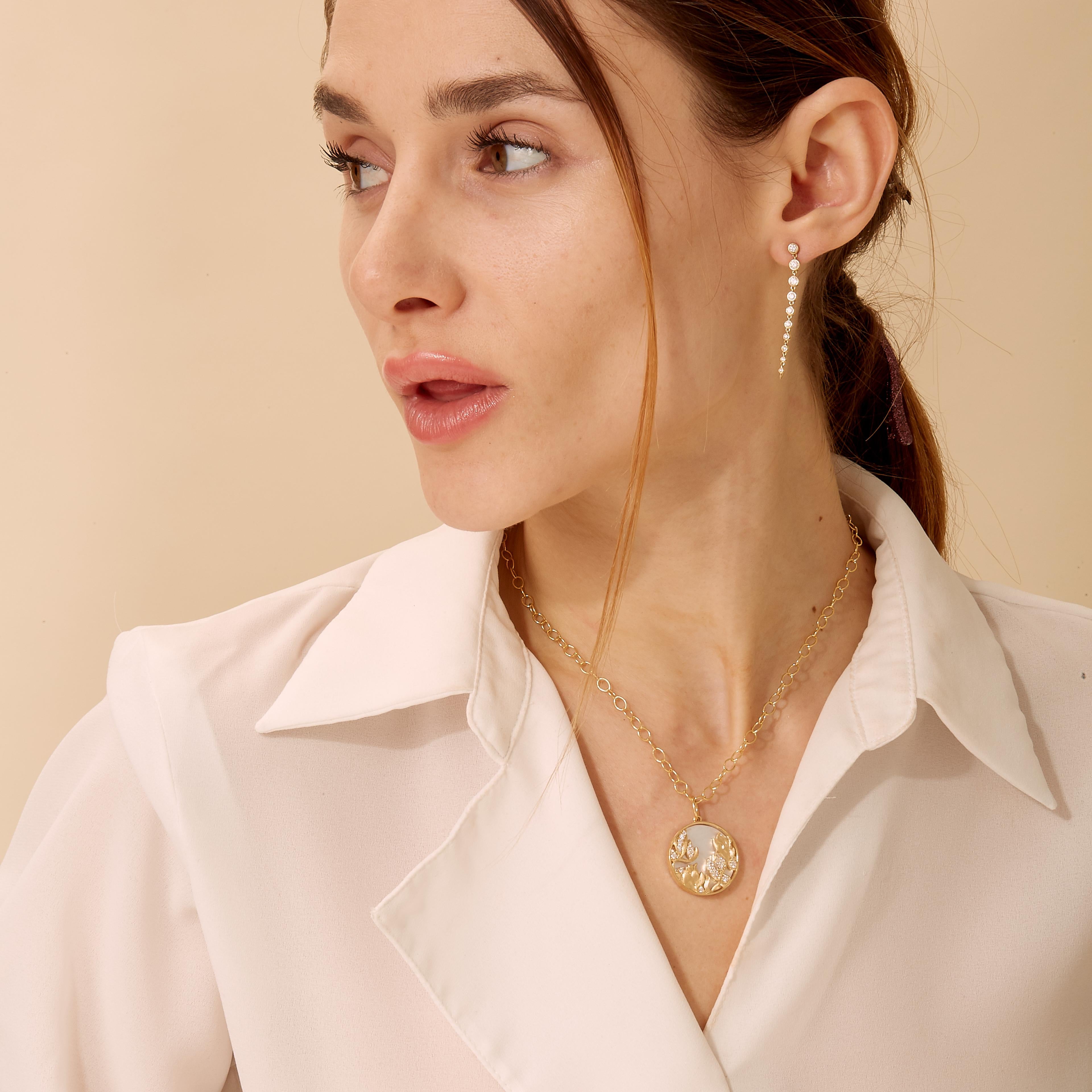 Created in 18 karat yellow gold
Mother of pearl 7.50 carats approx.
Diamonds 0.30 carat approx.
Limited edition
Chain sold separately

Meticulously crafted in 18 karat yellow gold, this limited edition pendant features a mesmerizing Mother of Pearl