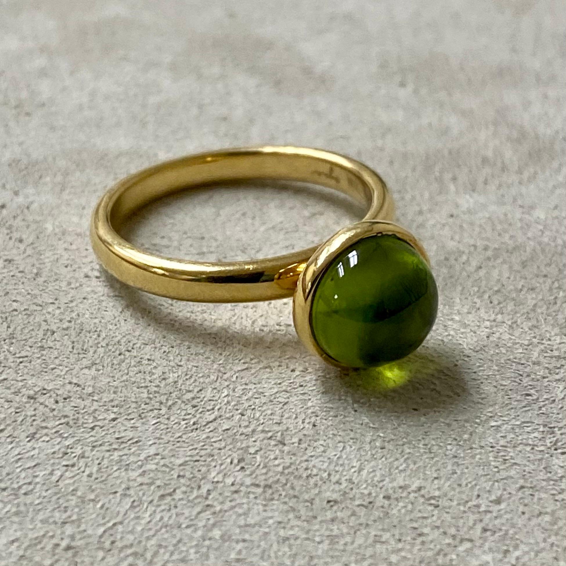 Created in 18 karat yellow gold
Peridot 2 carats approx.
Ring size US 6.5, can be sized upon request.

Exquisitely crafted in 18 karat yellow gold, this elegant ring features a stunning peridot set atop its band. Boasting a 2-carat size, this piece