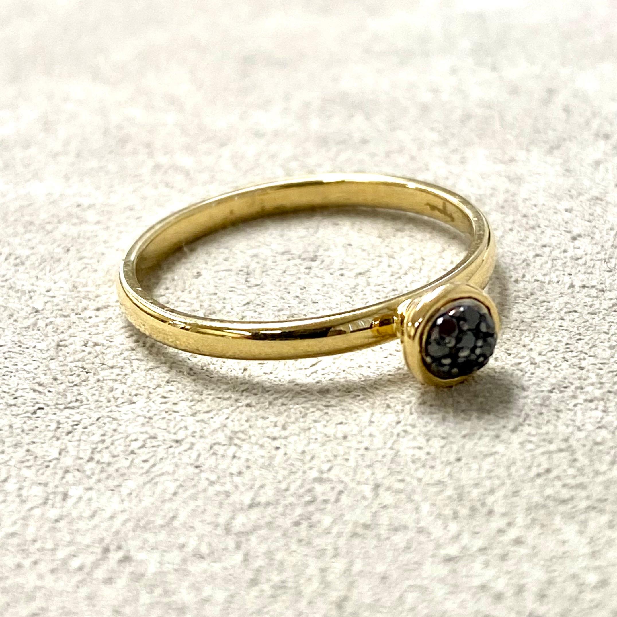 Created in 18 karat yellow gold
Black diamonds 0.10 carat approx.
Black diamond pave ring 5 mm diameter approx.
Ring size US 6.5, can be sized upon request.

Created in 18 karat yellow gold
Black diamonds 0.10 carat approx.
Black diamond pave ring 5
