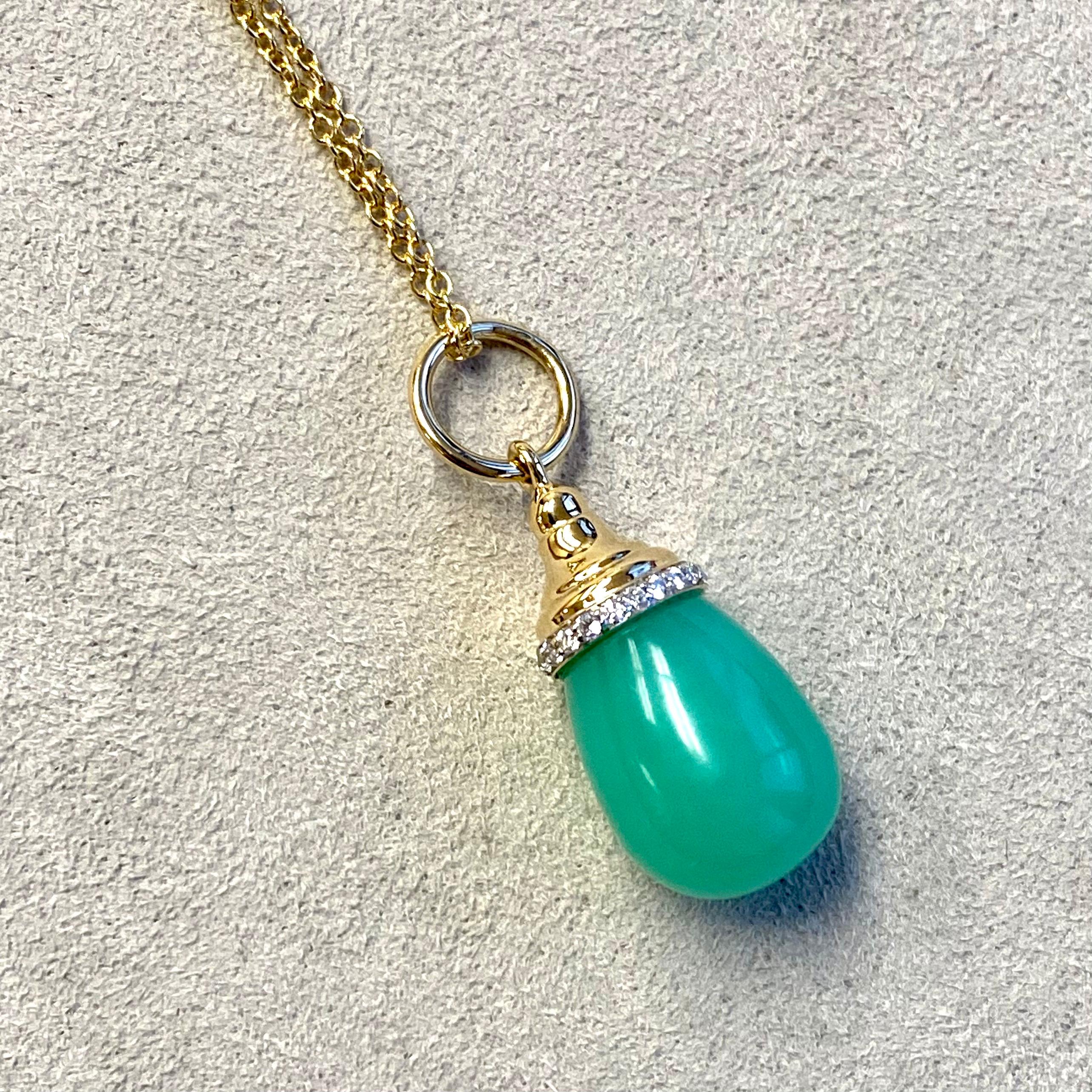 Created in 18 karat yellow gold
18 inch length
Chrysoprase 10 carats approx.
Diamonds 0.10 carat approx.

Handcrafted in 18 karat yellow gold, this pendant hangs delicately atop an 18-inch chain, adorned with an ethereal 10-carat Chrysoprase and